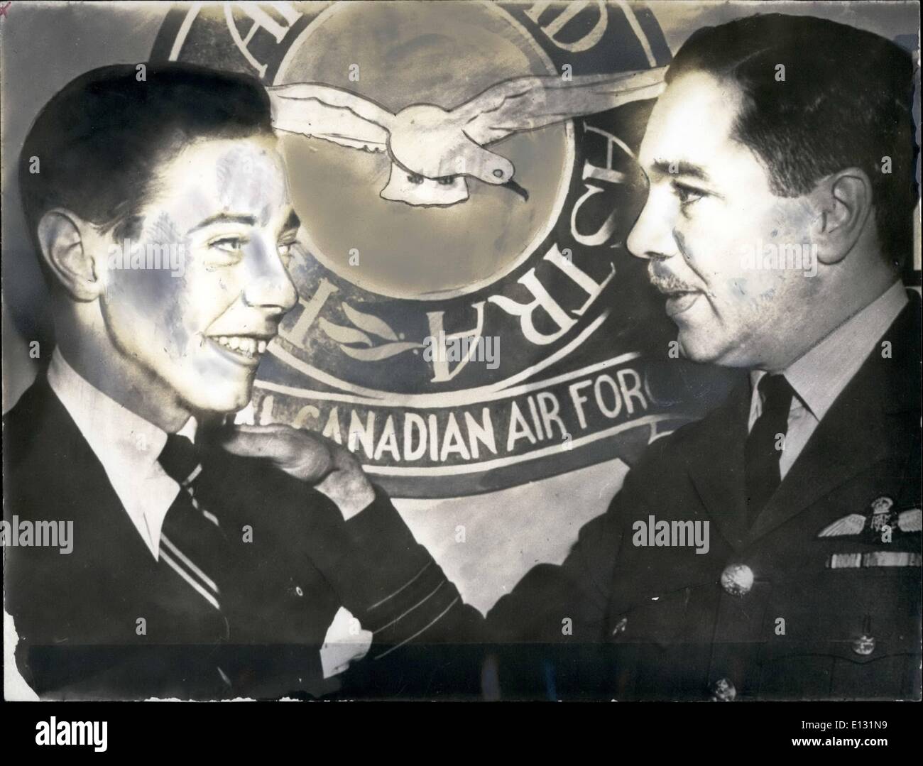 Feb. 26, 2012 - L.R: Pierre Rodier and Pacher Paul G. Rodier. Son Sues Daddy for support: Taschereau Pierre Rodier and his father, Paul G. Rodier, shown here in 1942 when both served int he Royal Canadian Air Force. Stock Photo