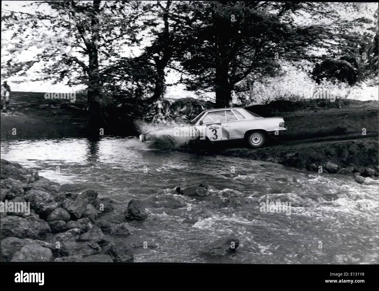 Feb. 26, 2012 - Bjorn Waldegaard in car Number 3, a Mercedes 450 SLC works model,. with battered left side door, negotiates a river in the driest ever Safari, Waldegaard who complained of steering difficulties throughout the third leg after leading throughout almost the second leg had more misery as he approached the Runvenjes section on Mt Kenya in the final stages. Three bolts sheared on his front axle and it was discovered the threads on his rear axle were gone also and there was no spare axle left. Waldegaard, reigning world rally oampanion. limped home in tenth place. Stock Photo