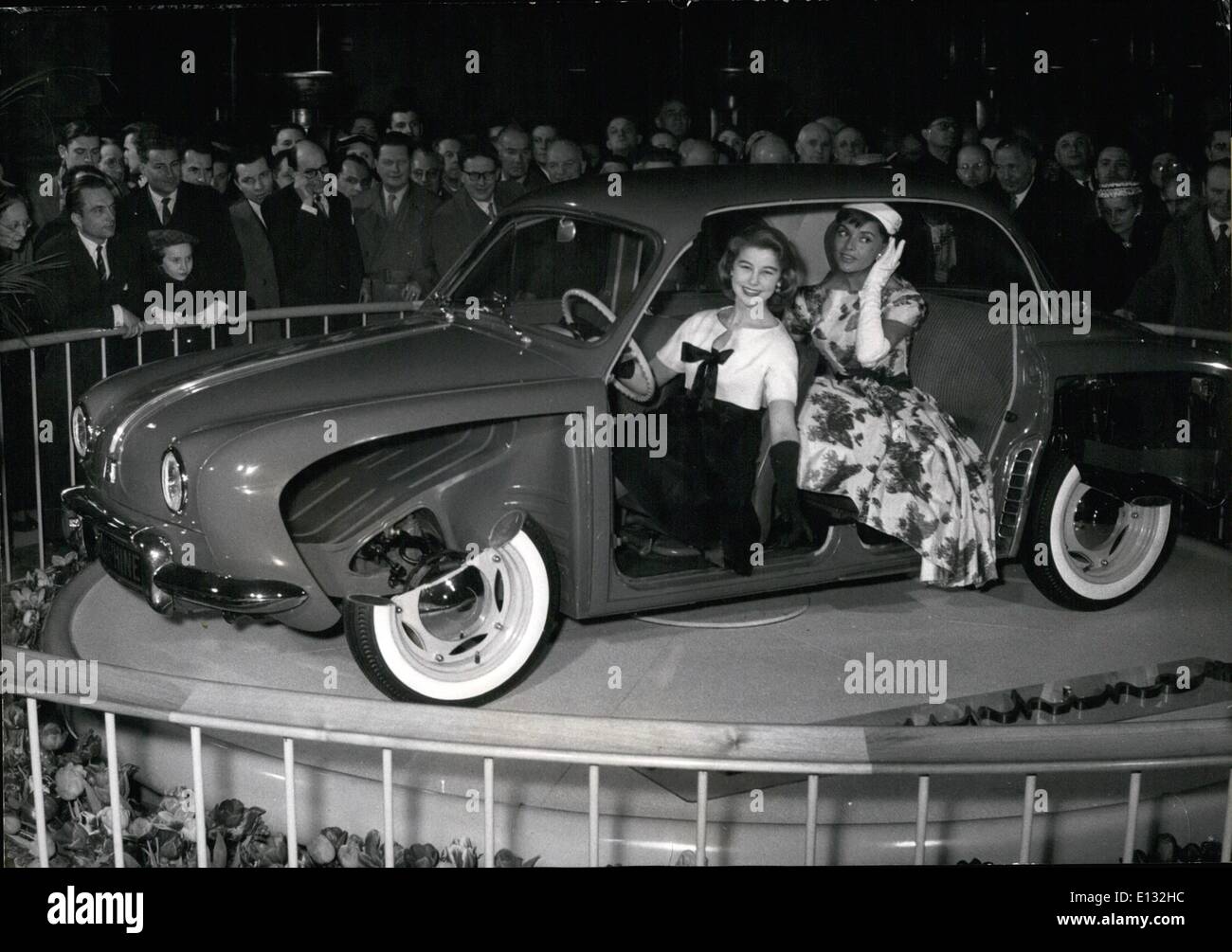 Feb. 26, 2012 - Renault presents new car: Dauphine. Dauphine, the latest achievement of Renault Motor Works was presented to the press this morning. OPS: Two Paris Mannequins presenting the new car. March 7/56 Stock Photo