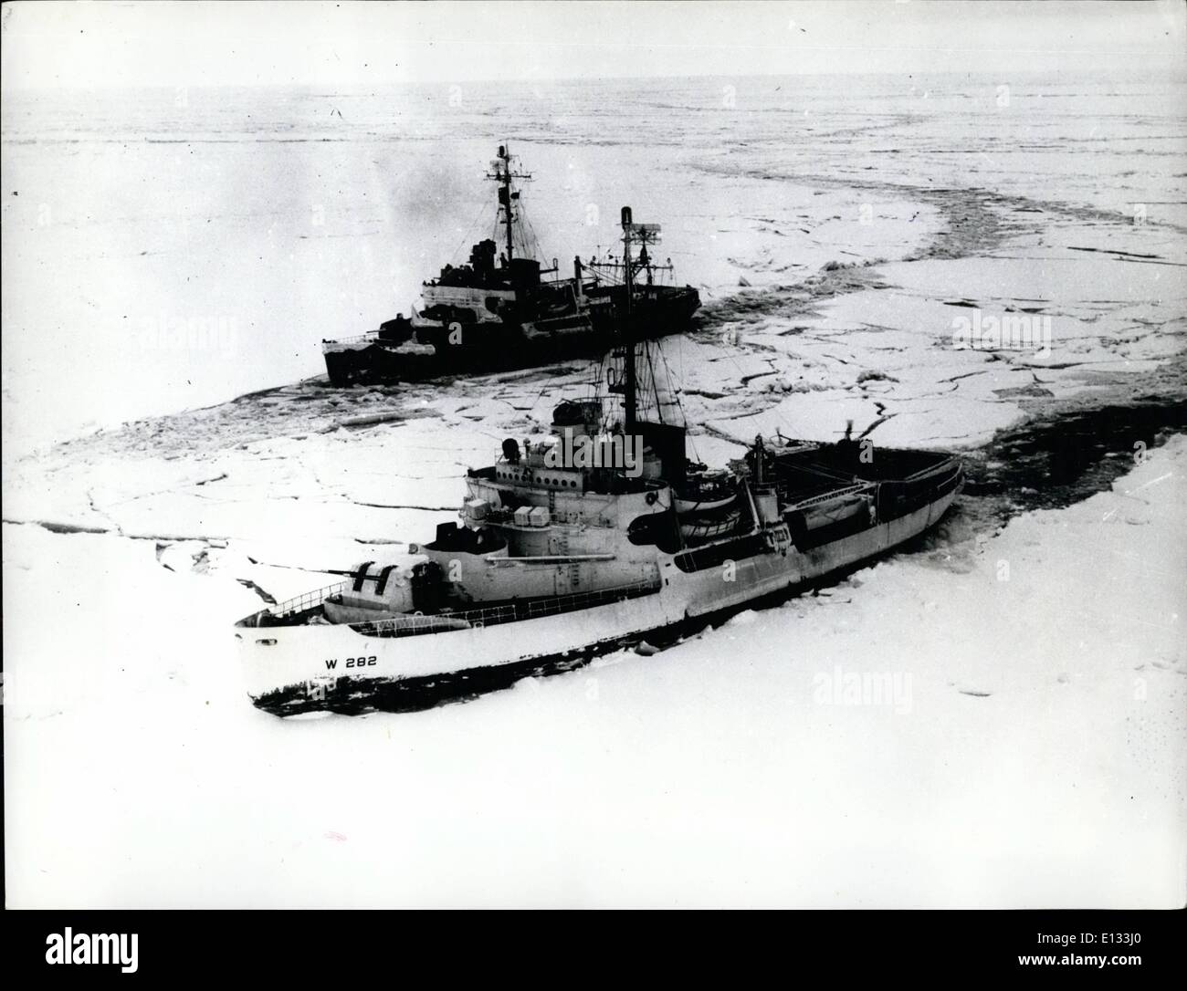 Feb. 26, 2012 - In this solid field of ice in the Bering Sea, the two icebreakers try a tandem method of breaking ice. Ramming, Stock Photo