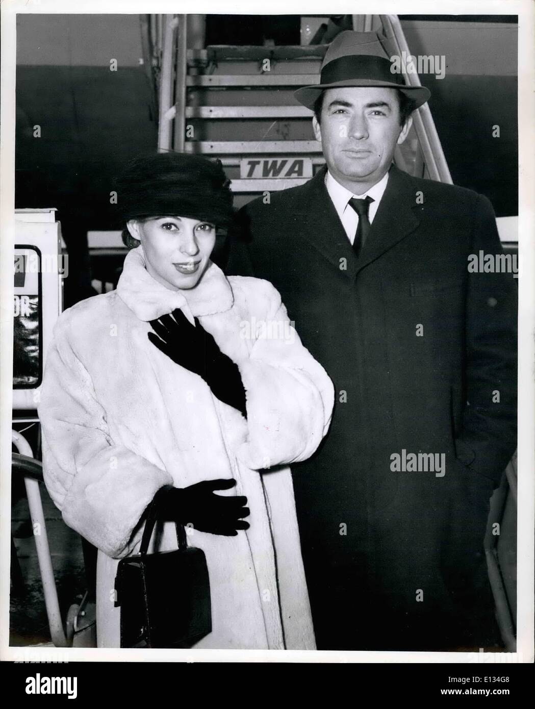 Feb. 28, 2012 - Idlewild Airport, N.Y., Dec 12 --Film star Gregory Peck and wife arrive TWA from Hollywood. The star is here for a series conferences regarding his Forthcomino Western, ''The Big Country' Stock Photo