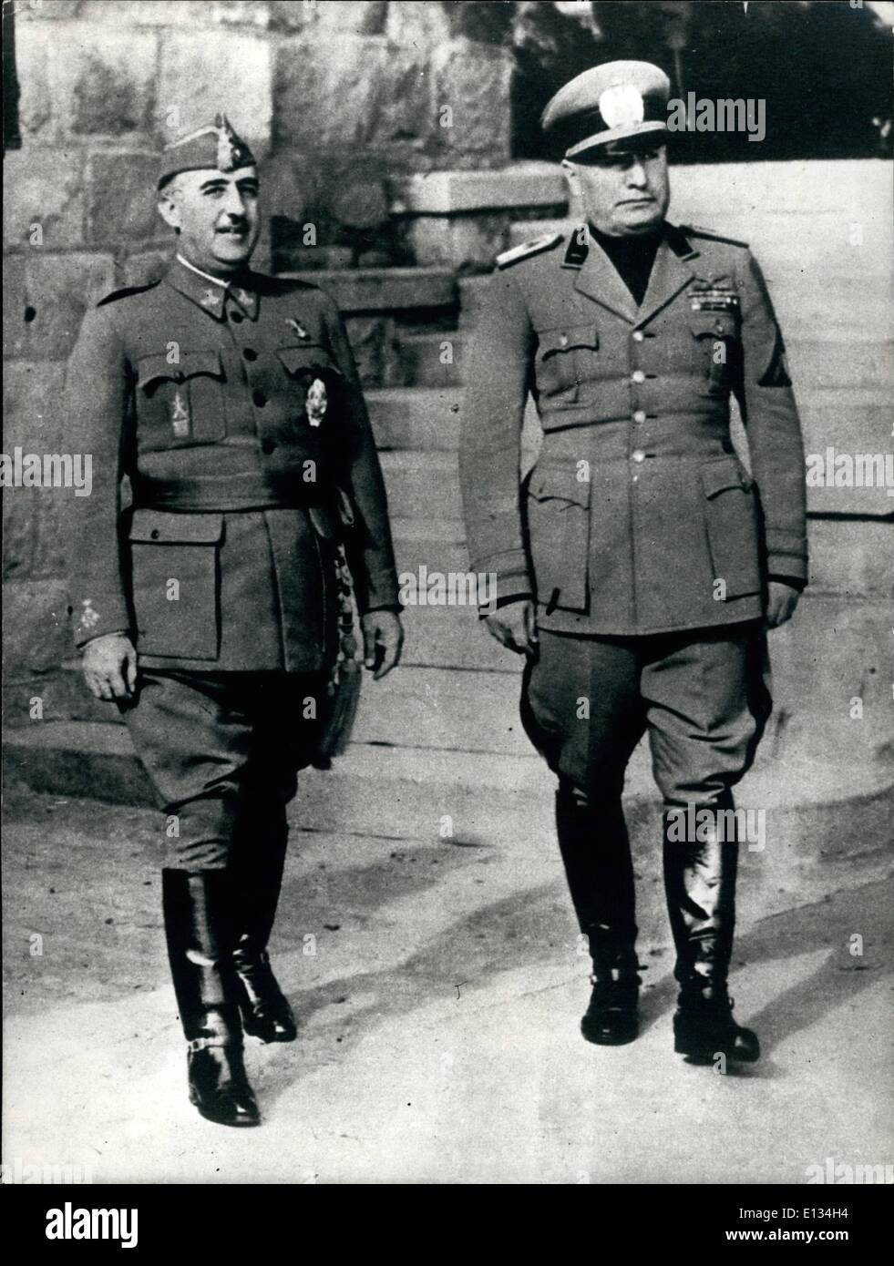 Feb. 28, 2012 - How Well Is General Franco?: General Franco the 82 year-old Spannish head of state suffered another heart attack in Madrid the second in the last five days. Rumours have it that he is about to hand over to Prince Juan Carlos the Dictator's choice as Head of State. Photo shows General Franco with Mussolini the Italian Dictator during their meeting in Spain in the late 30's. Stock Photo