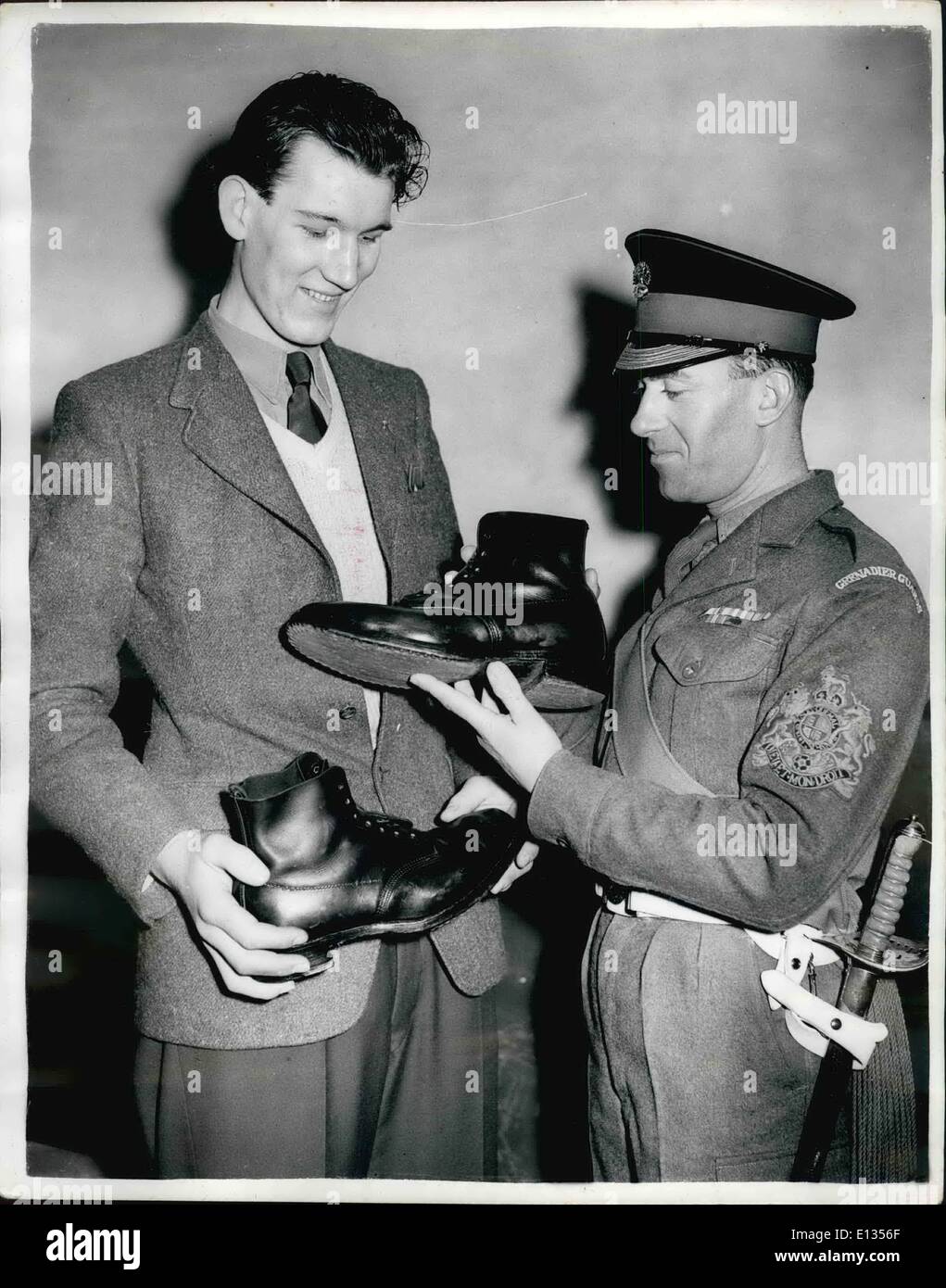 Feb. 28, 2012 - Tallest recruit brings his own boots. Robert waits for his ''issue'' to be made-to-measure.: Believed to be the Stock Photo