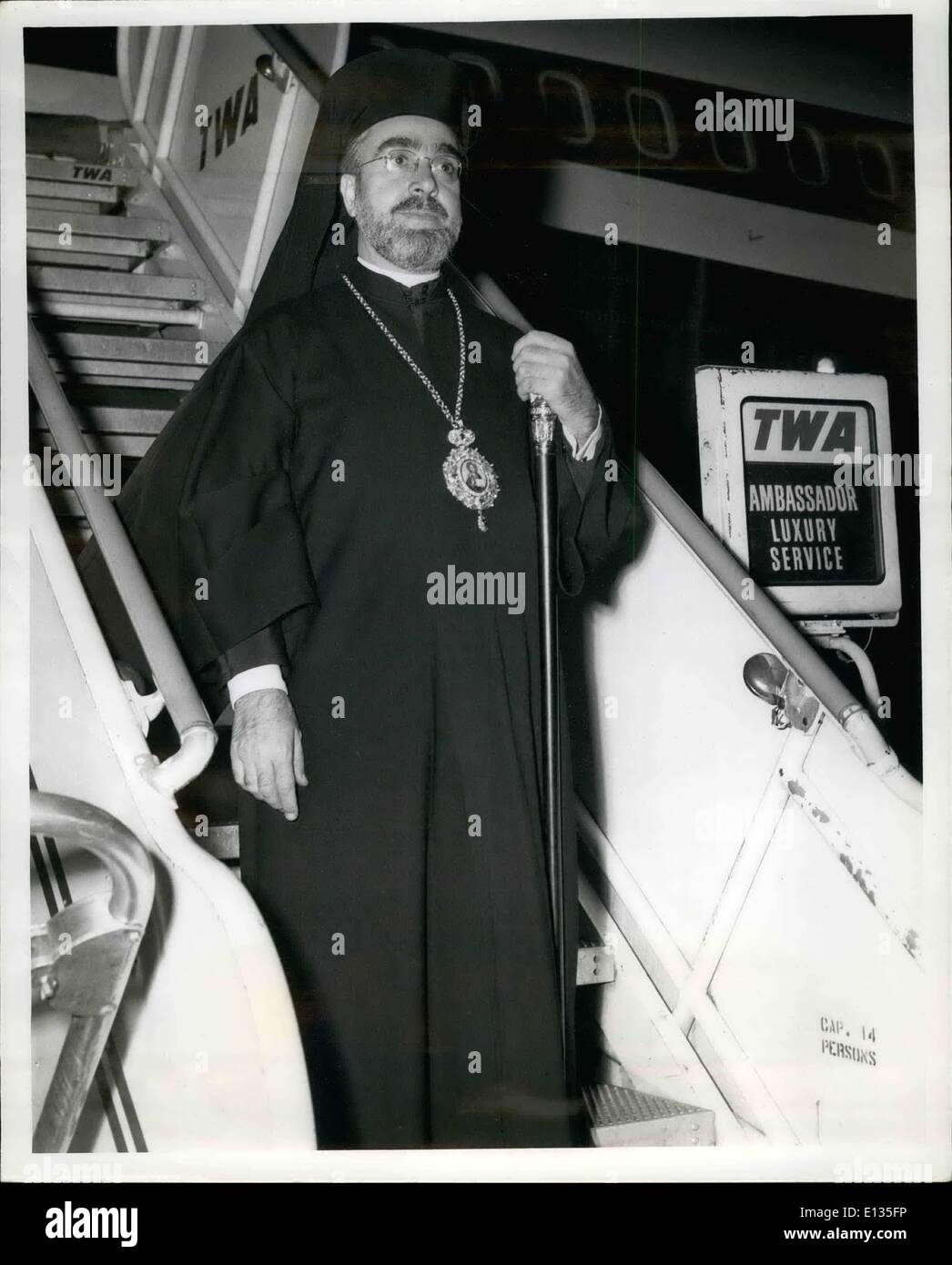 Feb. 28, 2012 - N.Y. International Airport, April 25, 1960. Archbishop Iakovos, Greek Orthodox primate in the Western hemisphere, is pictured late last night prior to boarding a TWA superjet for Paris en route to Istanbul where he will make a report on the weeping Madonnas of long island to patriarch Athenagoras I of Constantinople Durint the Holy Synod of the Council of Bishops. Archbishop Iakovos will be in Istanbul three weeks returning about May 15. Stock Photo