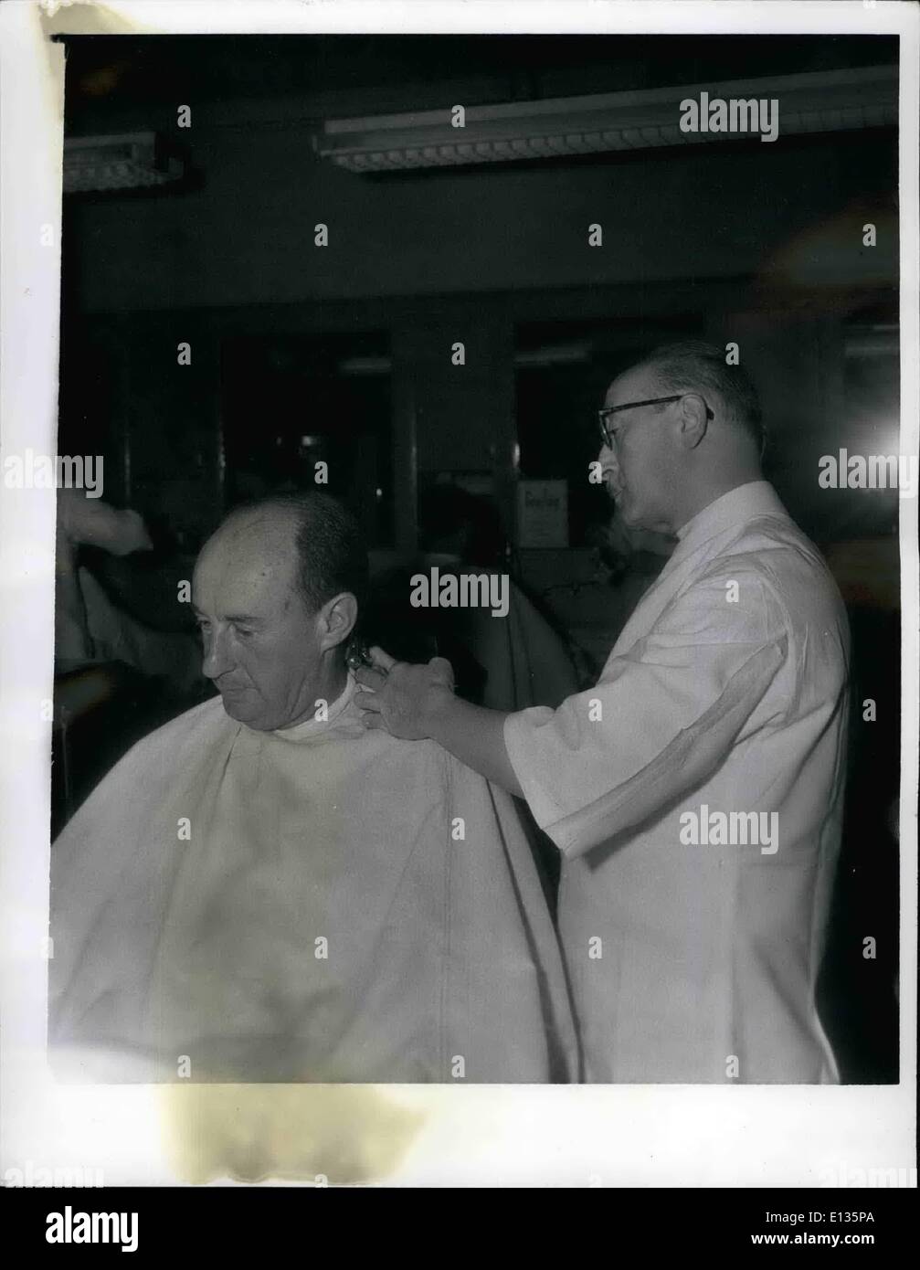 Feb. 28, 2012 - Adlai Stevenson during 1952 election campaign taking haircut between two engagements at RR Station. Stock Photo