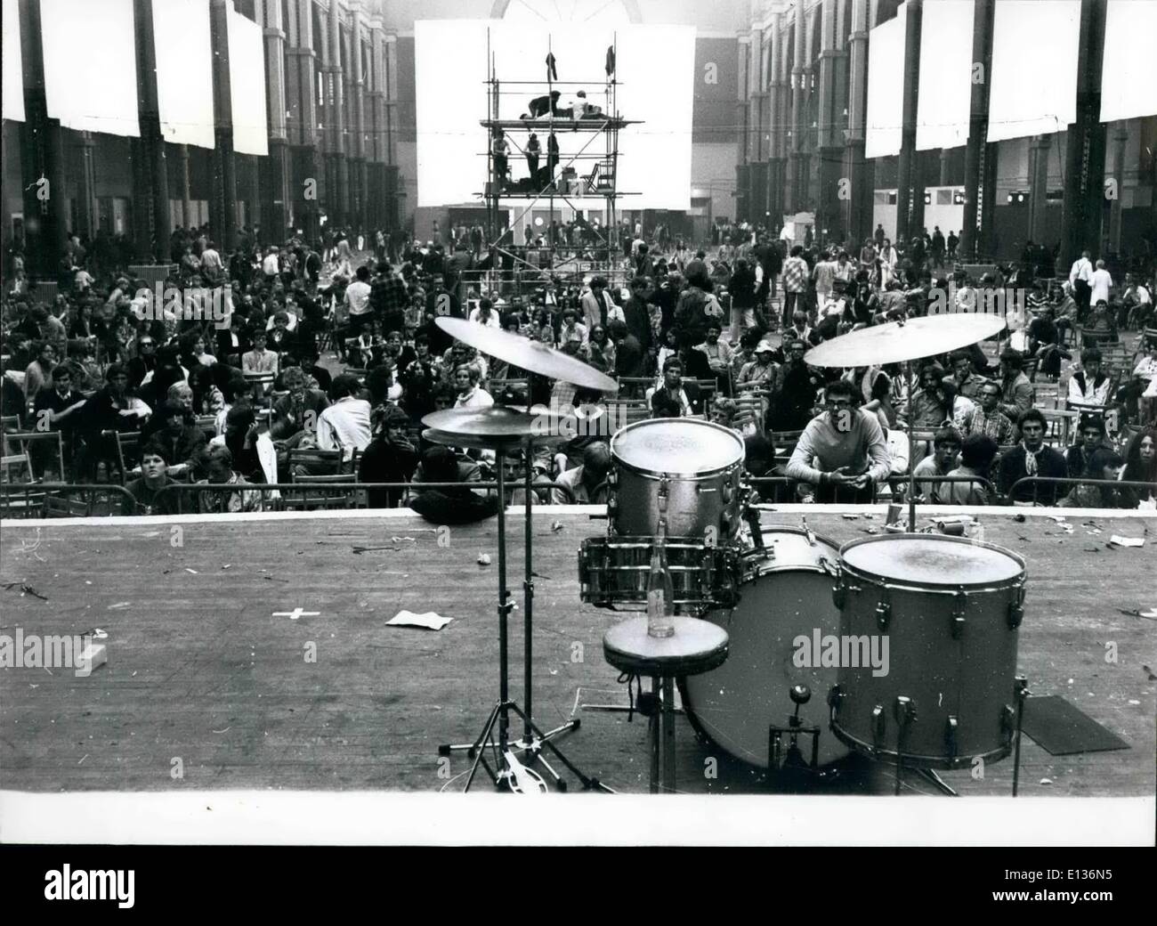 Feb. 28, 2012 - But the dawn has to come and even the groups begin to tire. Finally only their unattended instruments remain, mute, on the platform. But, still they won't go home. Stock Photo