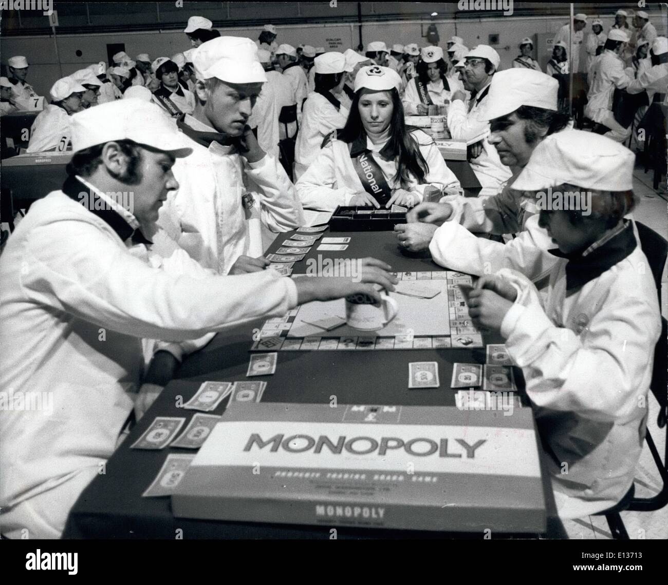 Feb. 28, 2012 - British monopoly championships staged on a nuclear reactor file at Thor burn near Bristol.: The British monopoly championships are being staged on a nuclear reactopile at the Oldury on Savern power station at Thornbury near Bristol. Nearly 150 men, women and children through out Britain are taking part. Each competitor were wearing protective clothing while on the pile, and after leaving the reactor they all go through the decontamination wash Stock Photo
