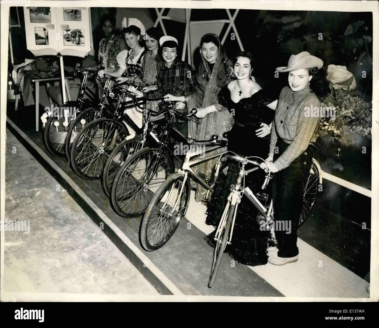 Feb. 29 2012 Pedal cycles for export at the cycle show. Ladies from many countries. Photo shows charming young ladies in clothes of the countries they represent seen with Hercules