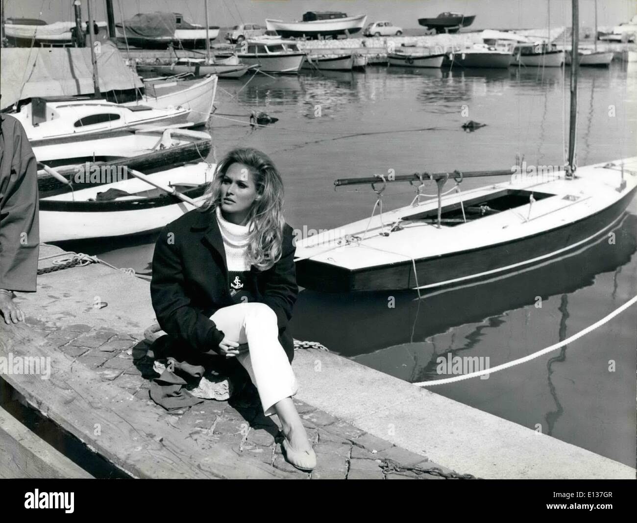 Feb. 29, 2012 - Ursula Andress comes back to Rome.: Blonde-beautiful Swiss actress Ursula Andress partner of Sean Connery in James Bond series came  ok to Rome yesterday. The Icy Sphynx as she it called at Hollywood lived here in Rome for several years before to begin her billant movie career. She had many friends here and  declared to be happy to see again the gardens and beautiful things there are in Rome. She was pictured this morning at Anzio where she opens an happy rest on the sunny little harbour on a yatch of some friends. Ursula will probably be filming in Rome next month. Stock Photo