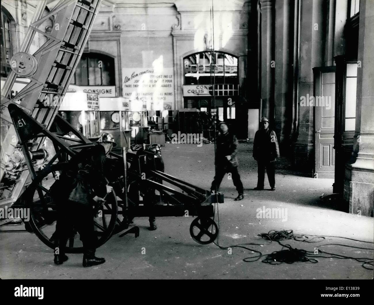Feb. 29, 2012 - New plastic bomb outrages in Paris. A plastic time bomb laid n the Austerlitz Station cloak-room exploded this morning. One person was injured. OPS: Firemen examining the damages. Cloakroom is in the background. April 23rd/61 Stock Photo