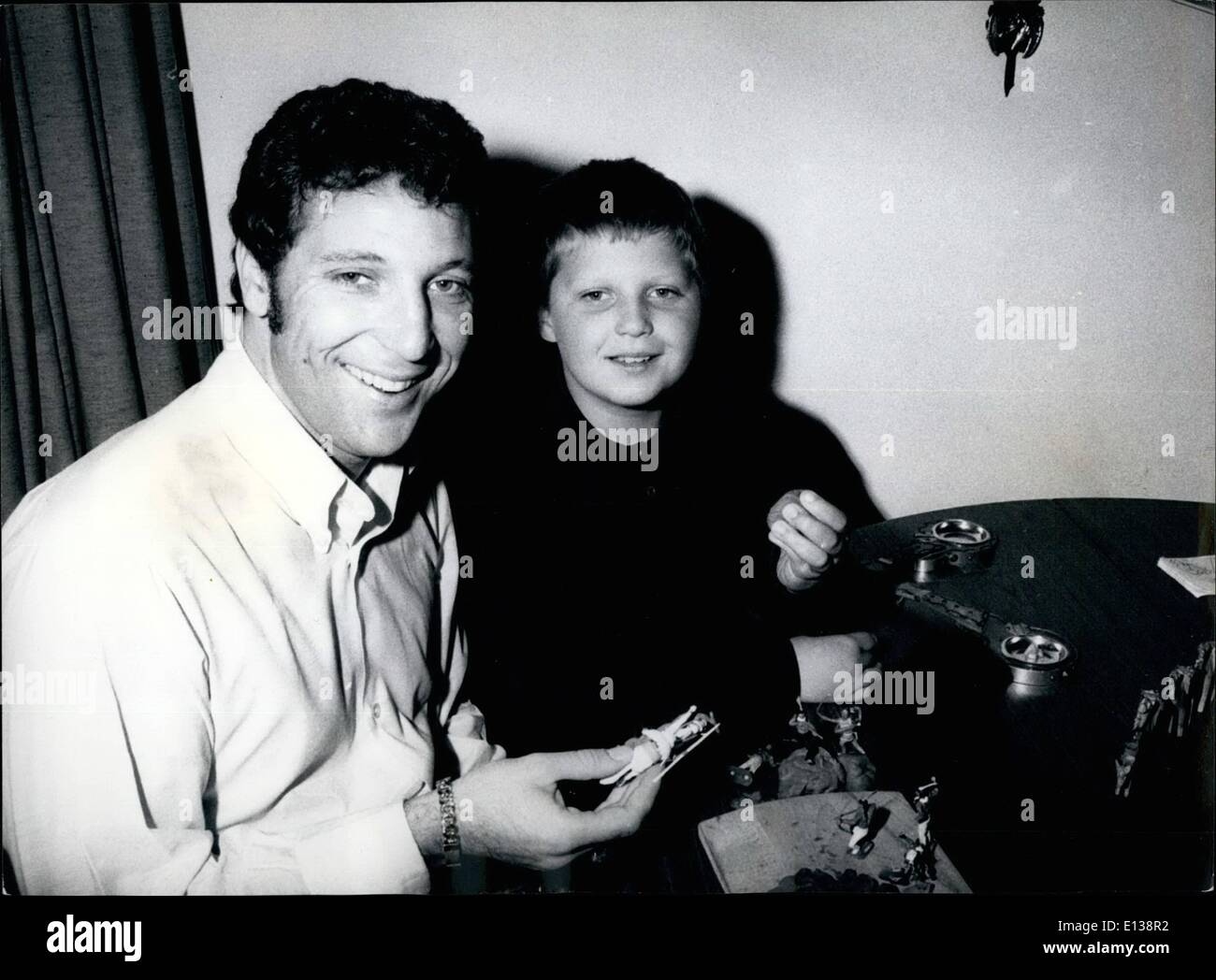 Feb. 29, 2012 - Tom Jones with his eight-year old son Mark. Stock Photo