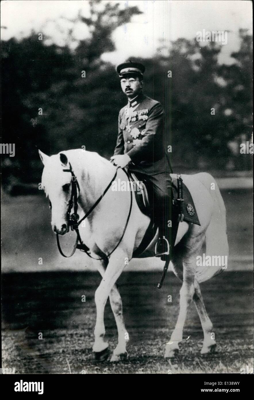 Feb. 29, 2012 - Emperor Hirohito on his horse reviews his troops parading before the Imperial palace in Tokyo before leave for overseas. Stock Photo