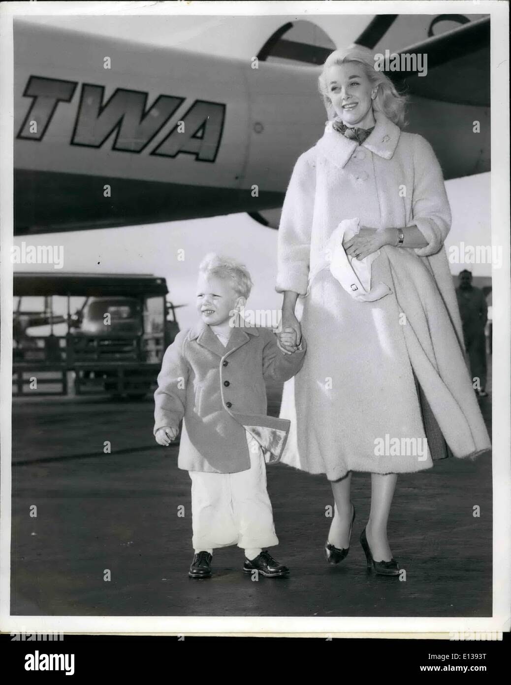 Feb. 29, 2012 - Idlewild Airport, N.Y. May 27 - Actress Jan Sterling son Adams Douglas,2 1/2, walk away hand-in-hand from the Twa Super-G Flight from Los Angeles. Miss Sterling is in town to Plug her latest flicker ''High school Confidential. Stock Photo