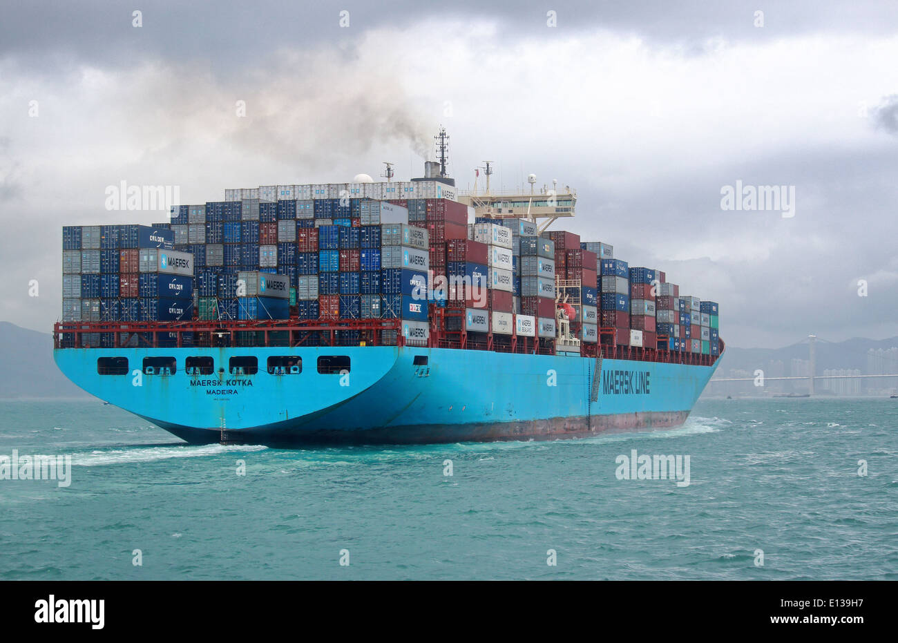 Container ship MAERSK KOTKA (IMO: 9085534, MMSI: 255805595) with containers in Hong Kong Stock Photo