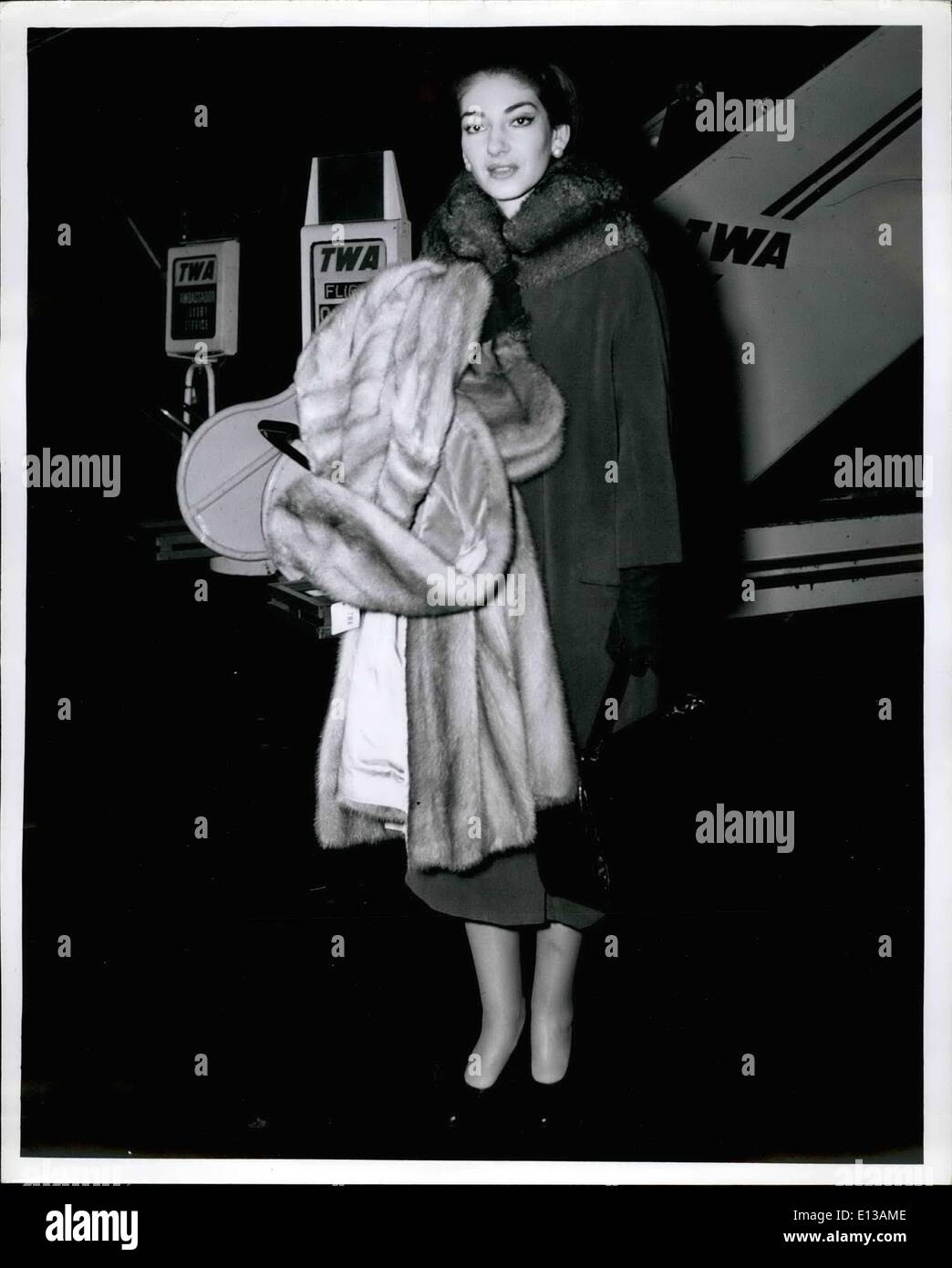 Feb. 29, 2012 - Idlewild Airport, N.Y., Nov. 10 -- Opera Star Maria Callas, an early-morning arrival, is well equipped to handle our cool weather as seen here after flying in via TWA from Paris. She will be leaving soon for Dallas, Texas, where she will fulfill a singing engagement. Stock Photo