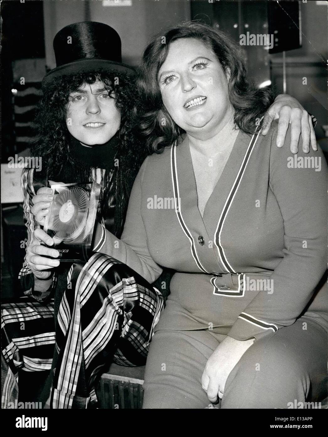 Feb. 29, 2012 - 1972 Disc Music Poll Awards. The 1972 Disc Music Poll Awards were presented today at Hatchetts, Piccadilly. Keystone Photo Shows: Janet Webb, who made the presentations, pictured with Marc Bolan, leader of the top British group, T.Rex. Stock Photo