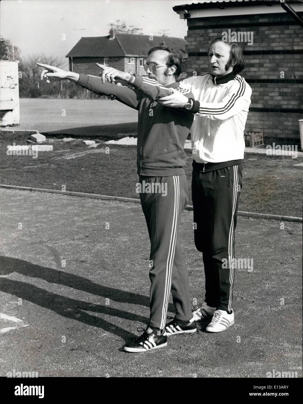 Feb. 29, 2012 - Ray Peart being directed by his coach Chris Maloney before the start of a practice run for the 60 metre sprint. Stock Photo