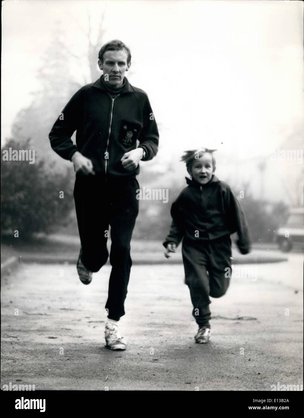 Feb. 29, 2012 - Training for his attempt on the 3,025 Trans America run world record, British athlete Bruce Tulloh, 32 - his six year old son Clive joins him in training. Stock Photo