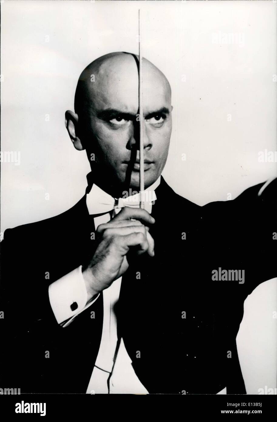 Feb. 29, 2012 - Yul Brynner as a Conductor: The Famous American Actor, Yul Brynner is in Paris now for the Filming of ''Once mre with Feeling'', produced and directed by Stanley Donen. In this Film, Yul Brynner plays the part of a famous conductor. Photo shows Yul Brynner in a scene of the film. Stock Photo