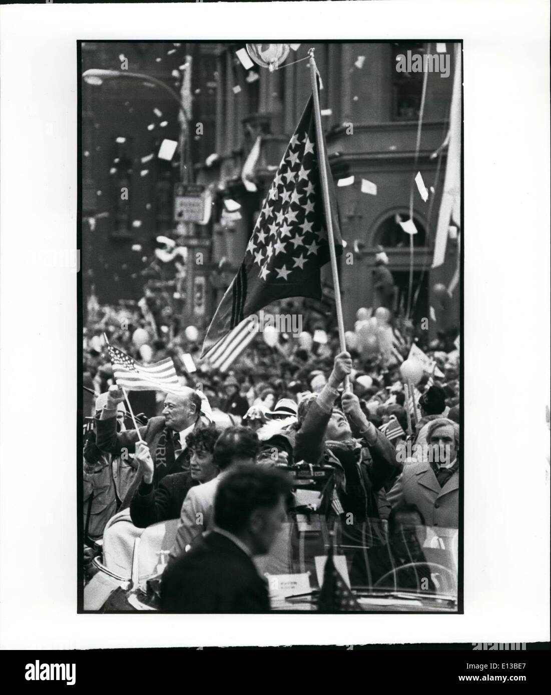 Feb. 29, 2012 - Major Koch and Former hostage Moorehead Kennedy headed the ticker - tape parade in New York with flags and I LOVE NEW YORK BANNERS. Stock Photo