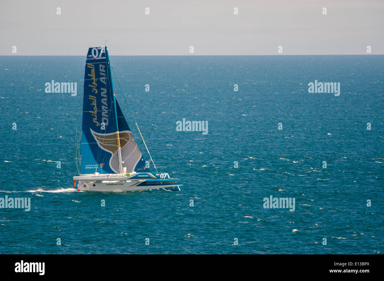 Oman Air Racing yacht taking part in Fastnet race at Cowes Week Isle of  White Stock Photo