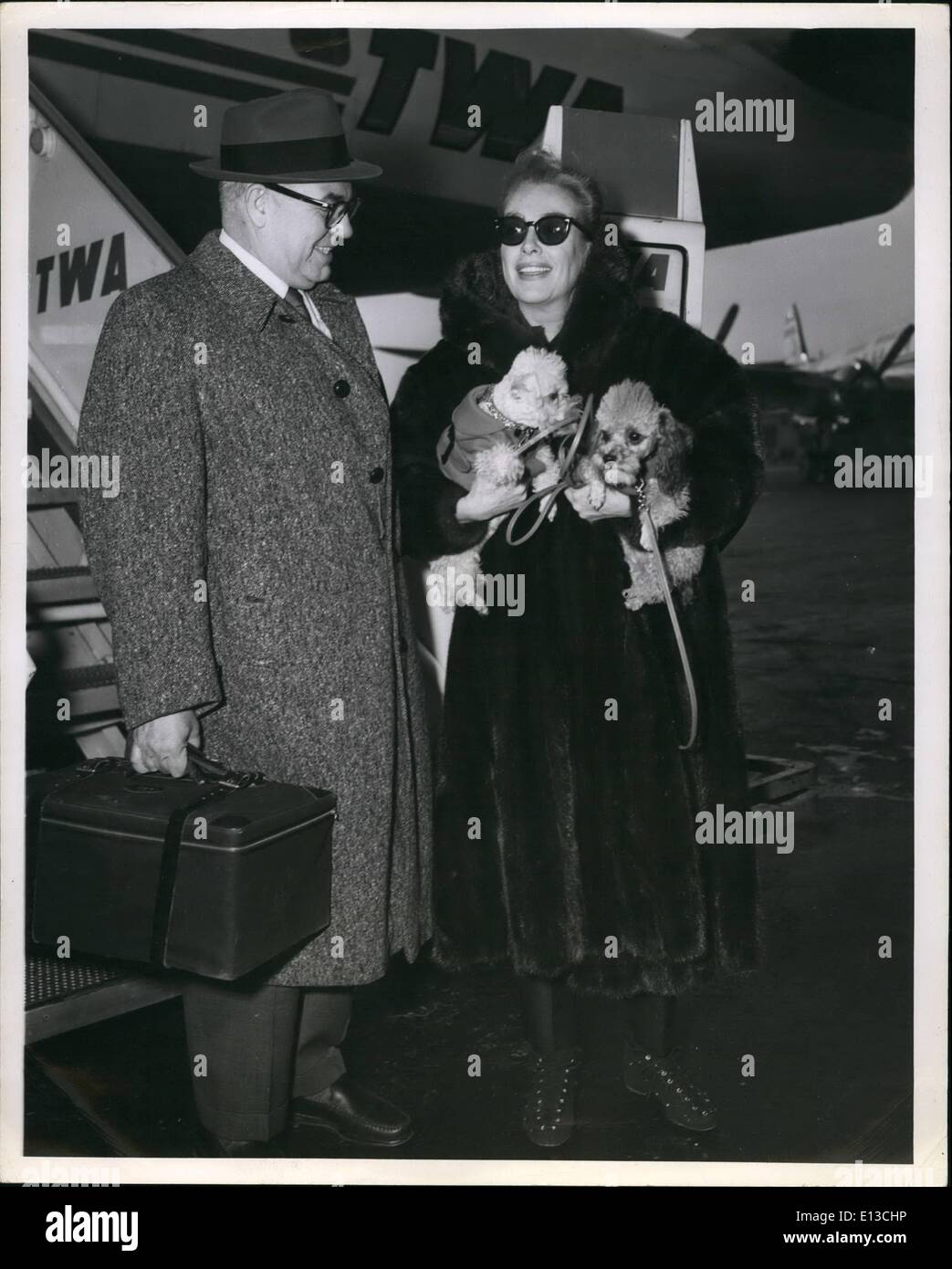 Feb. 29, 2012 - Movies Star Joan Crawford, her husband, Al Steele, President Pepsi-Cola, and two poodles arrived in town for a short visit aboard a TWA Jestream flight from Los Angeles. Stock Photo