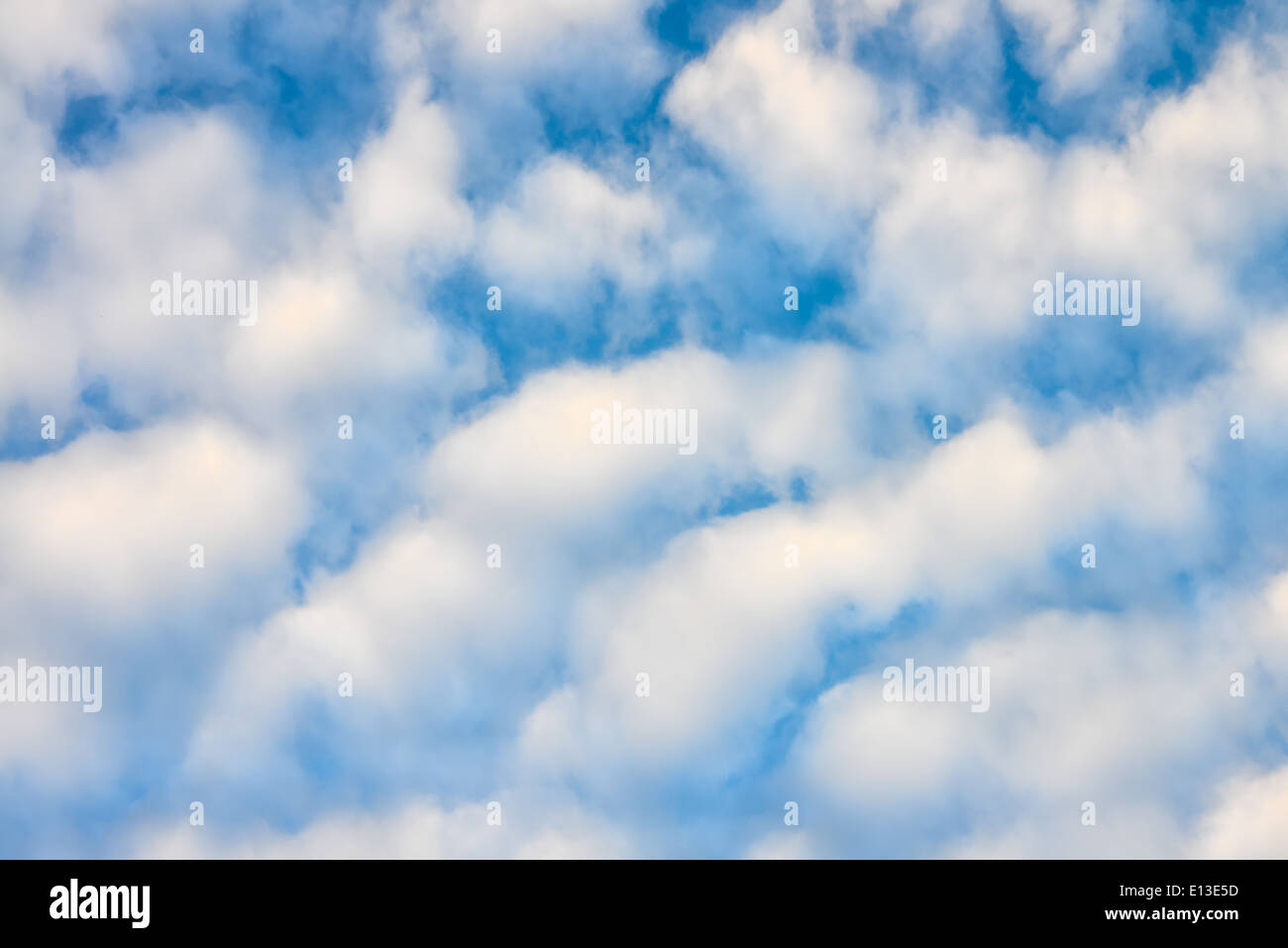 The blue sky and white fluffy clouds Stock Photo - Alamy