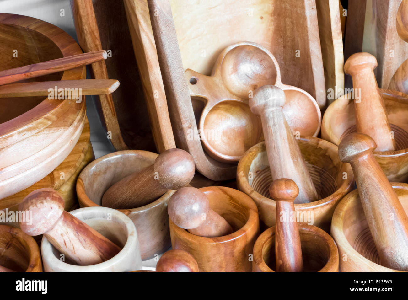 Wooden mortars and pestles for sale at a market stall, Mexico Ci Stock