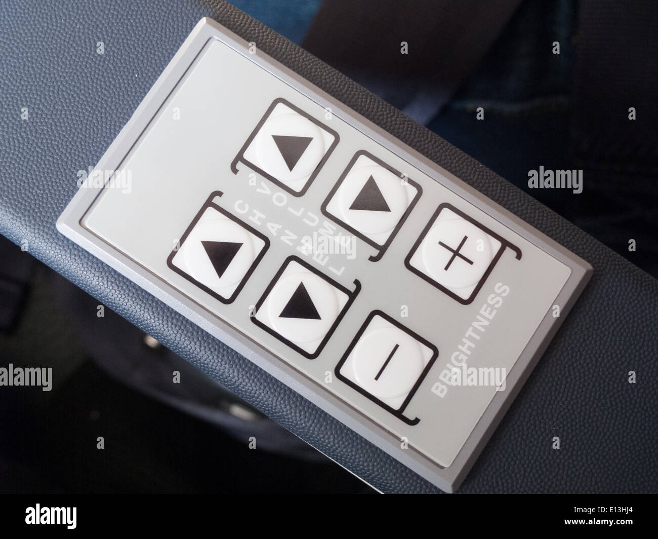 Push buttons on the armrest of airplane seat Stock Photo Alamy