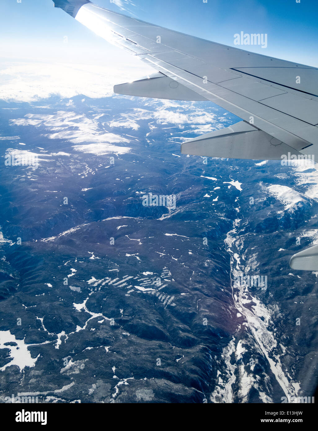 Aerial view of mountain range viewed from airplane, Alberta's Ro Stock Photo