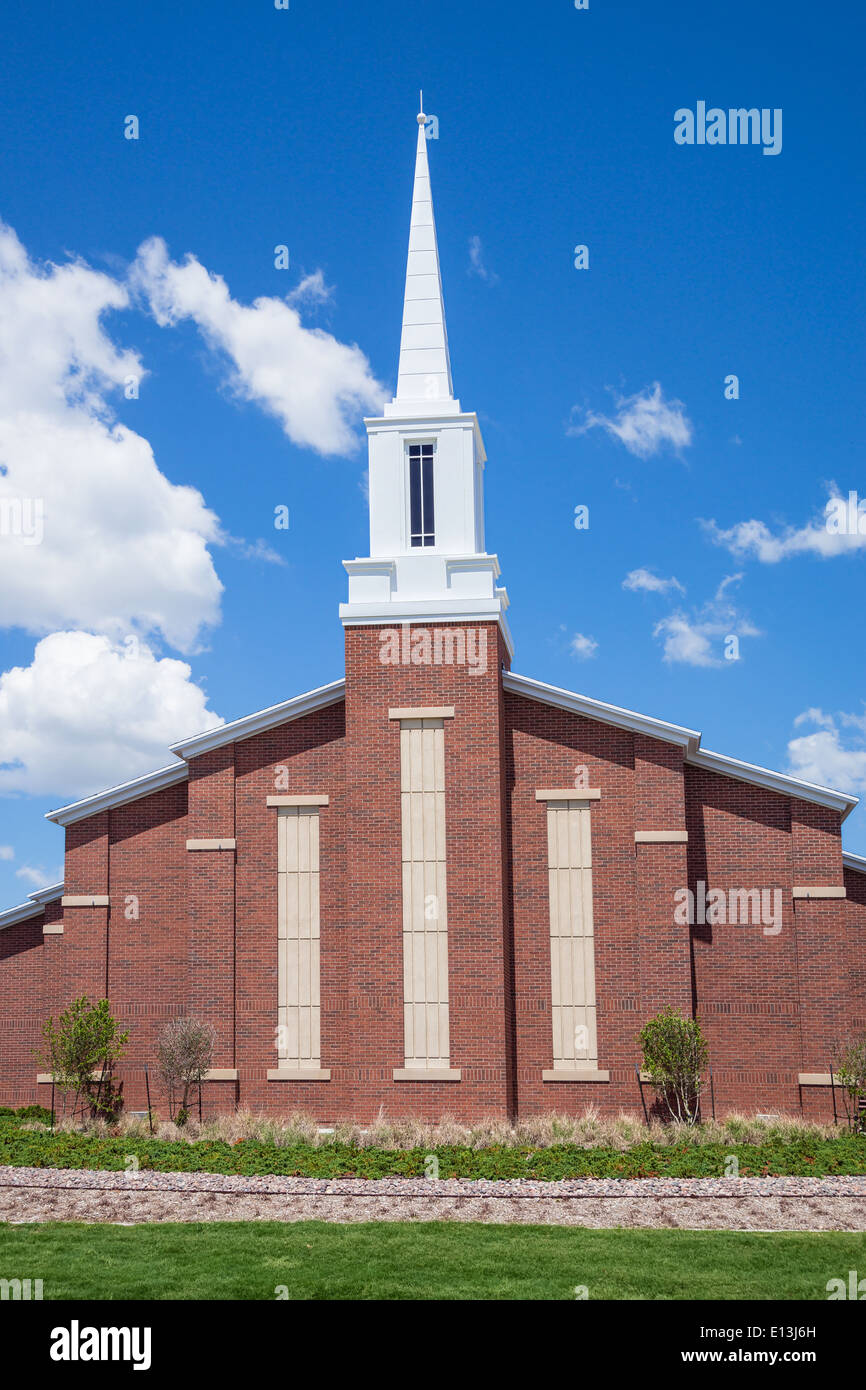 Mormon church against blue sky and white clouds Stock Photo