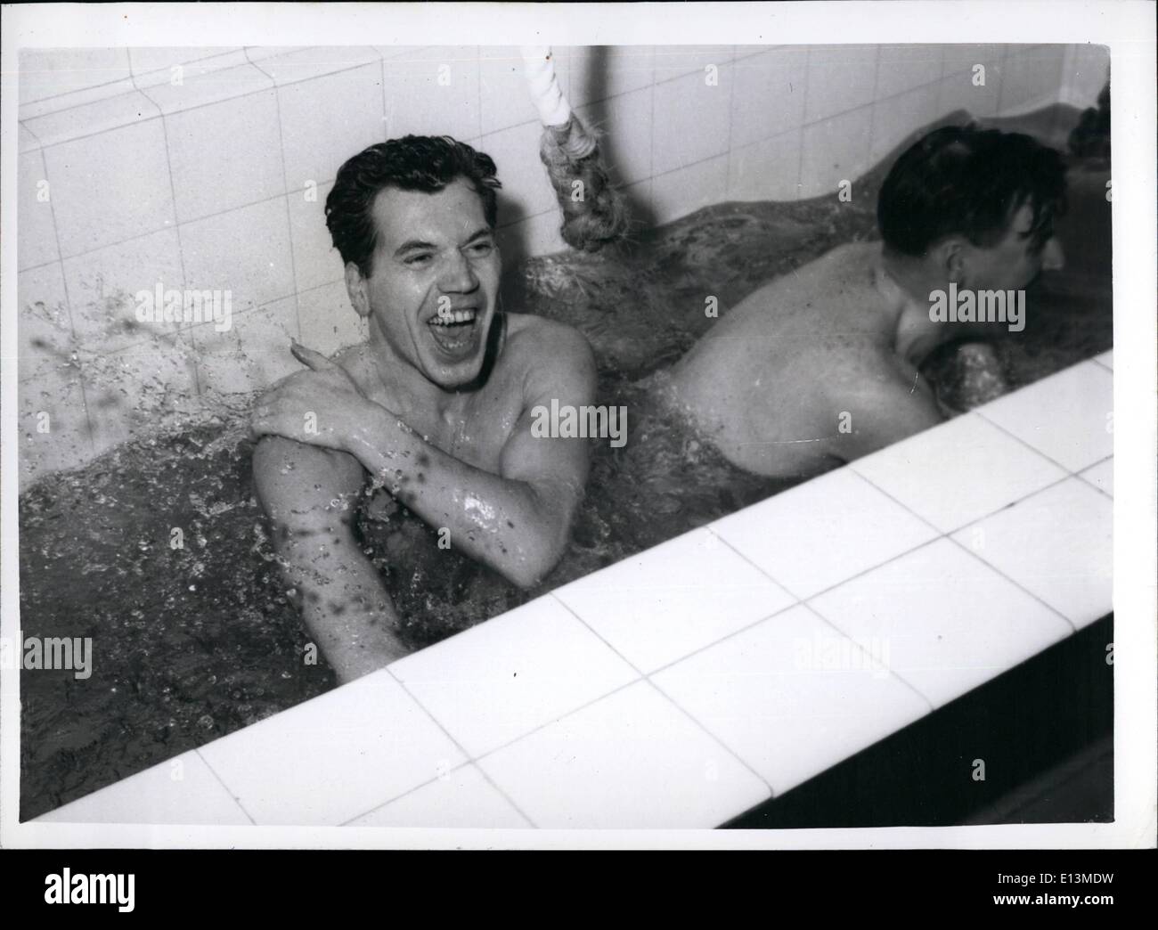 Mar. 22, 2012 - Ooh! It's Cold: Mr. Begg (left) enjoy the cold plunge with another customer. Stock Photo