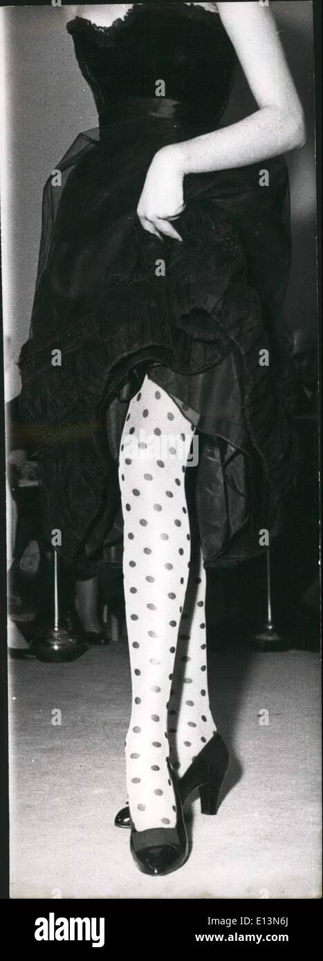 Mar. 22, 2012 - Jacques Fath introduces revolutionary stockings: The latest in Fancy stockings displayed by a mannequin at the first fashion show of the season at Jacques Fath's the famous Paris dressmaker. The stockings are with black dots and are entitles ''Lady Bird' Stock Photo