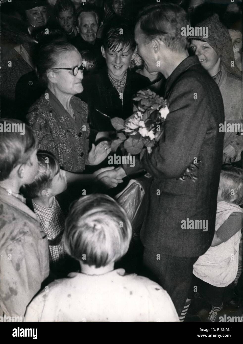 Mar. 22, 2012 - Returning home from Soviet Russia. : Everybody is glad with her Ã¢â‚¬Â¦. After long nine years of waiting and hope her son finally returned home. Stock Photo