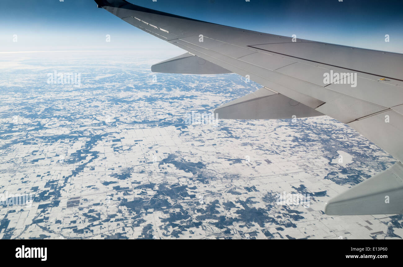 Aerial view of snow covered landscape viewed from airplane, Mexi Stock Photo