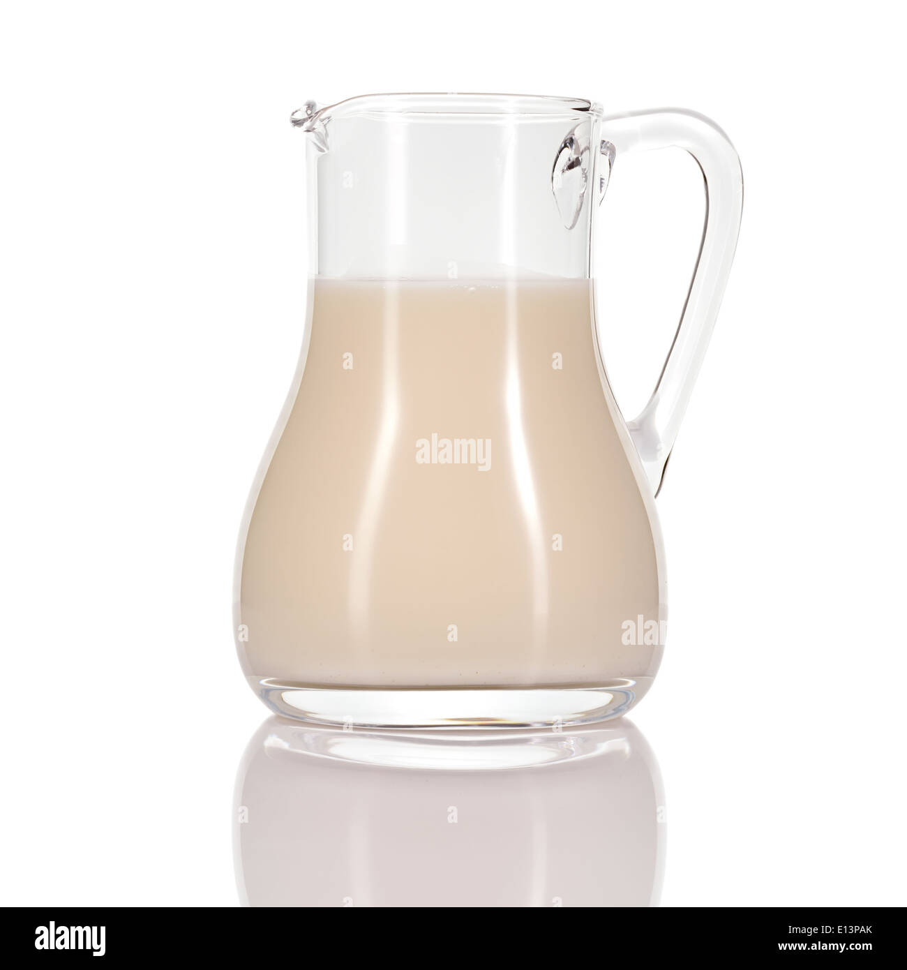 Almond milk as a substitute for dairy milk. Jug of almond milk isolated on white background. Stock Photo