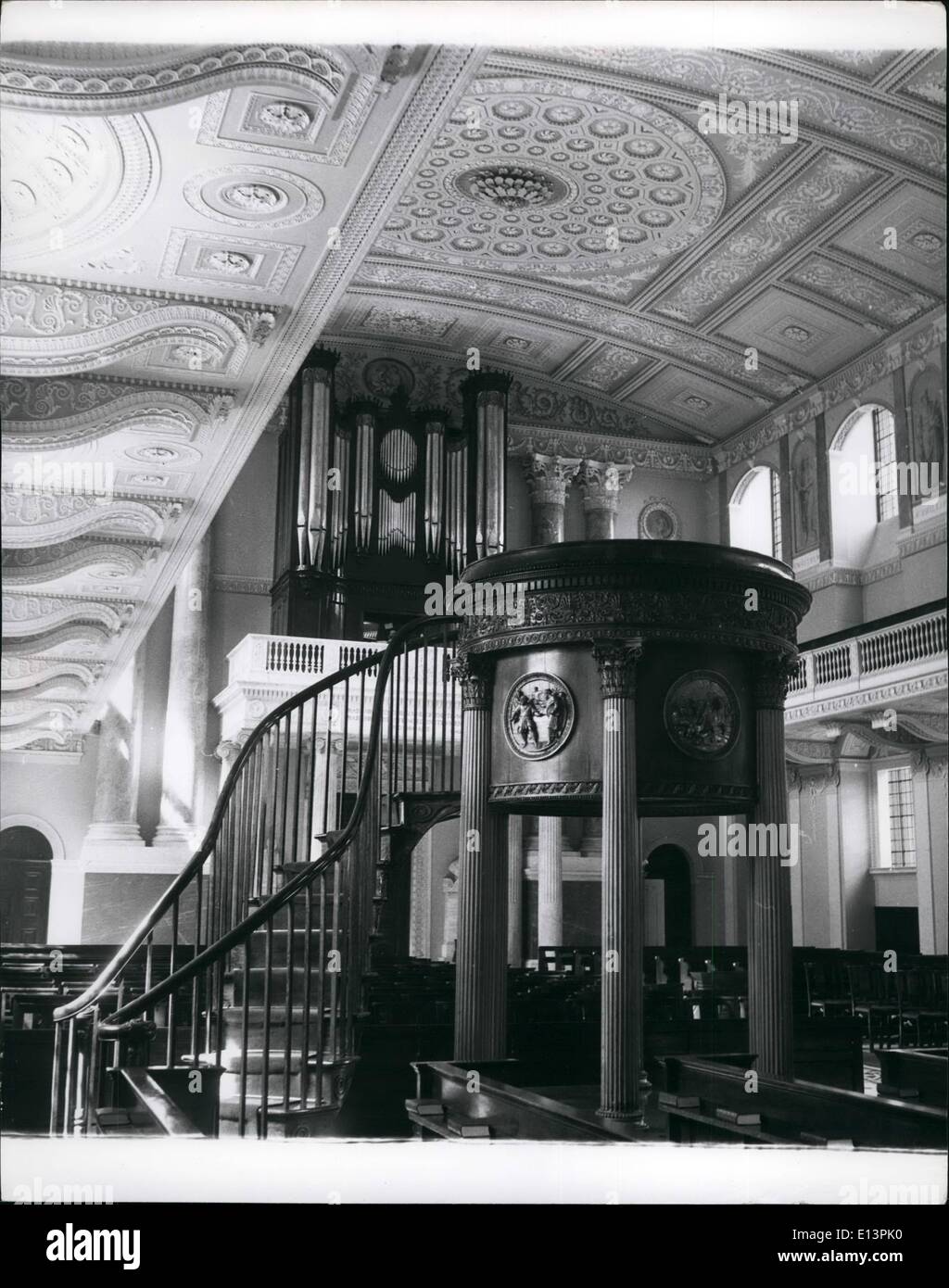 Mar. 22, 2012 - Greenwich Palace- the chapel; The circular pulpit supported by six fluted columns of lin wood , with a neembalture above, richly carved in the sauna material. The carver was Richard Lawrence, but the plaques between teh columns are by Benjamin West. The staircase and craft. Stock Photo