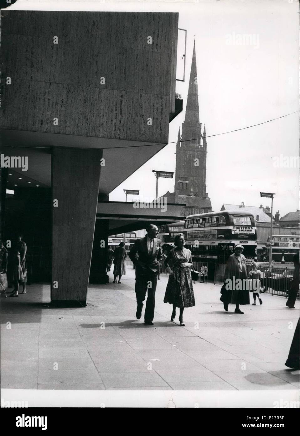 Mar. 22, 2012 - Arriving to stay at the Leofric Hotelare famous stage stars Jack Hulbert and his wife Cicely Courtneidge. In the background is the spire of the bombed out Cathedral. Stock Photo