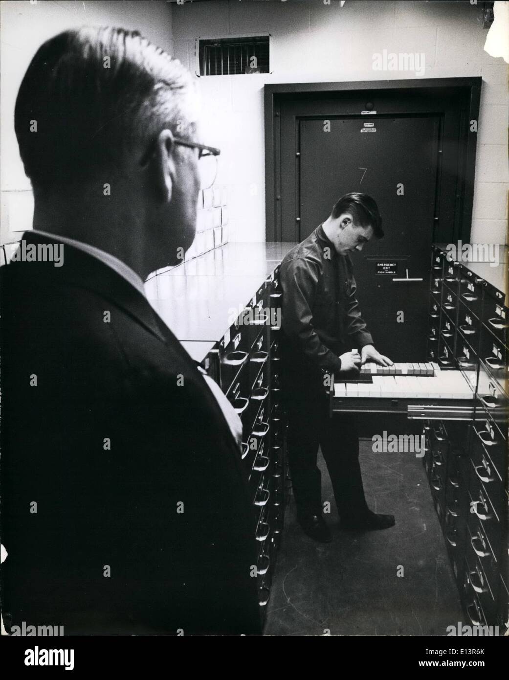 Mar. 22, 2012 - Mr. Walker supervising the handling of clients microfilms. Stock Photo