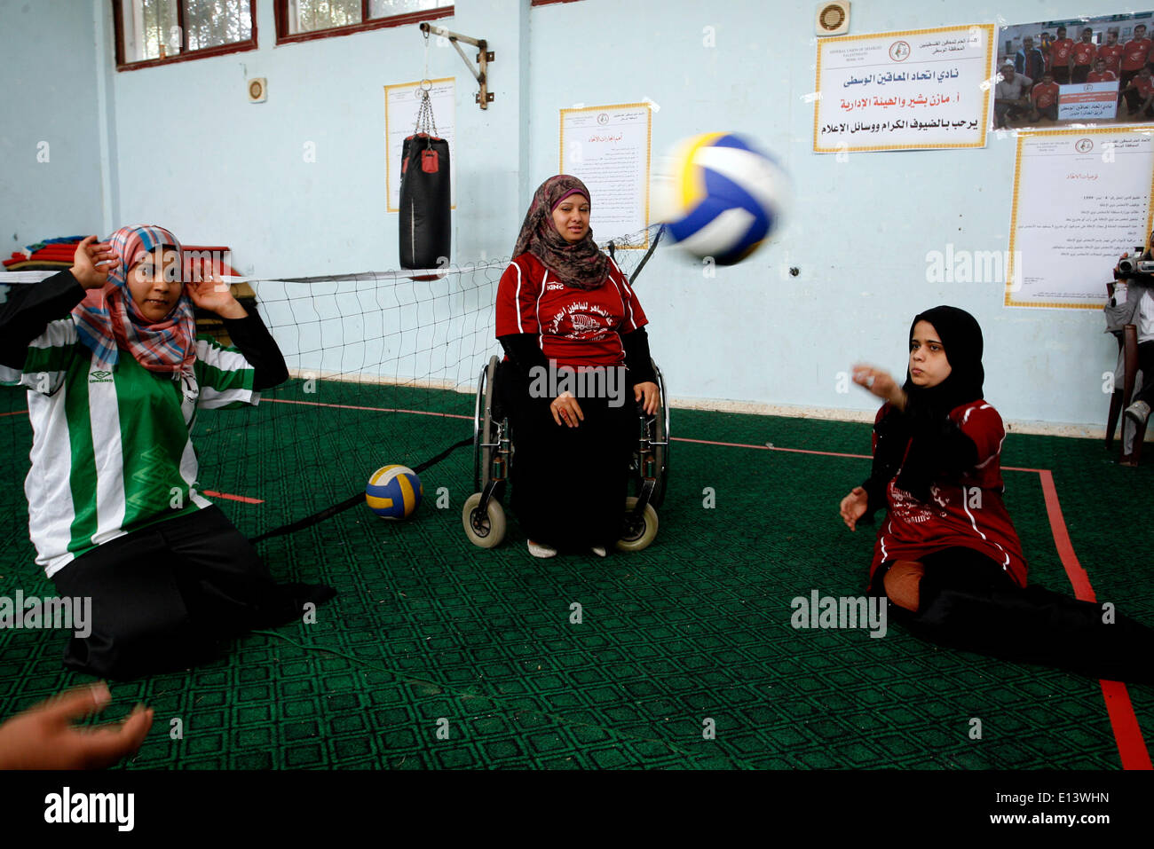 DEIR Al-BAlAH, PALESTINE - MAY 21: Disabled Palestinian volleyball of Women's a participates in Exercise a in Club Deir al-Balah in the central Gaza Strip on May 21, 2014. (Photo by Abed Rahim Khatib /Pacific Press) Stock Photo