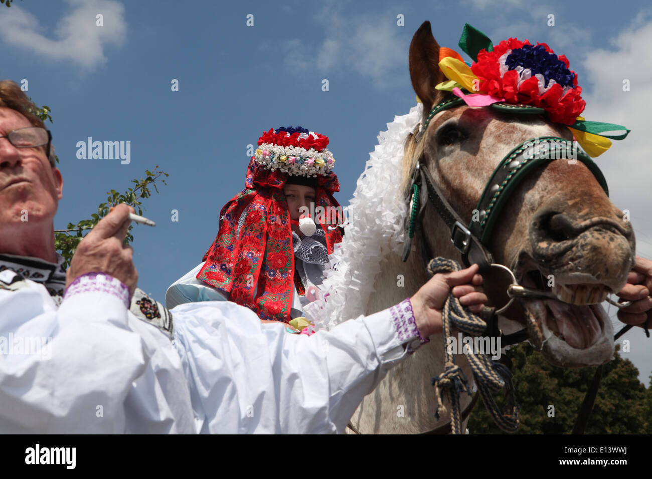 The Ride of the Kings. Traditional folklore festival in Vlcnov, Czech Republic. The boy king rides his horse. Stock Photo