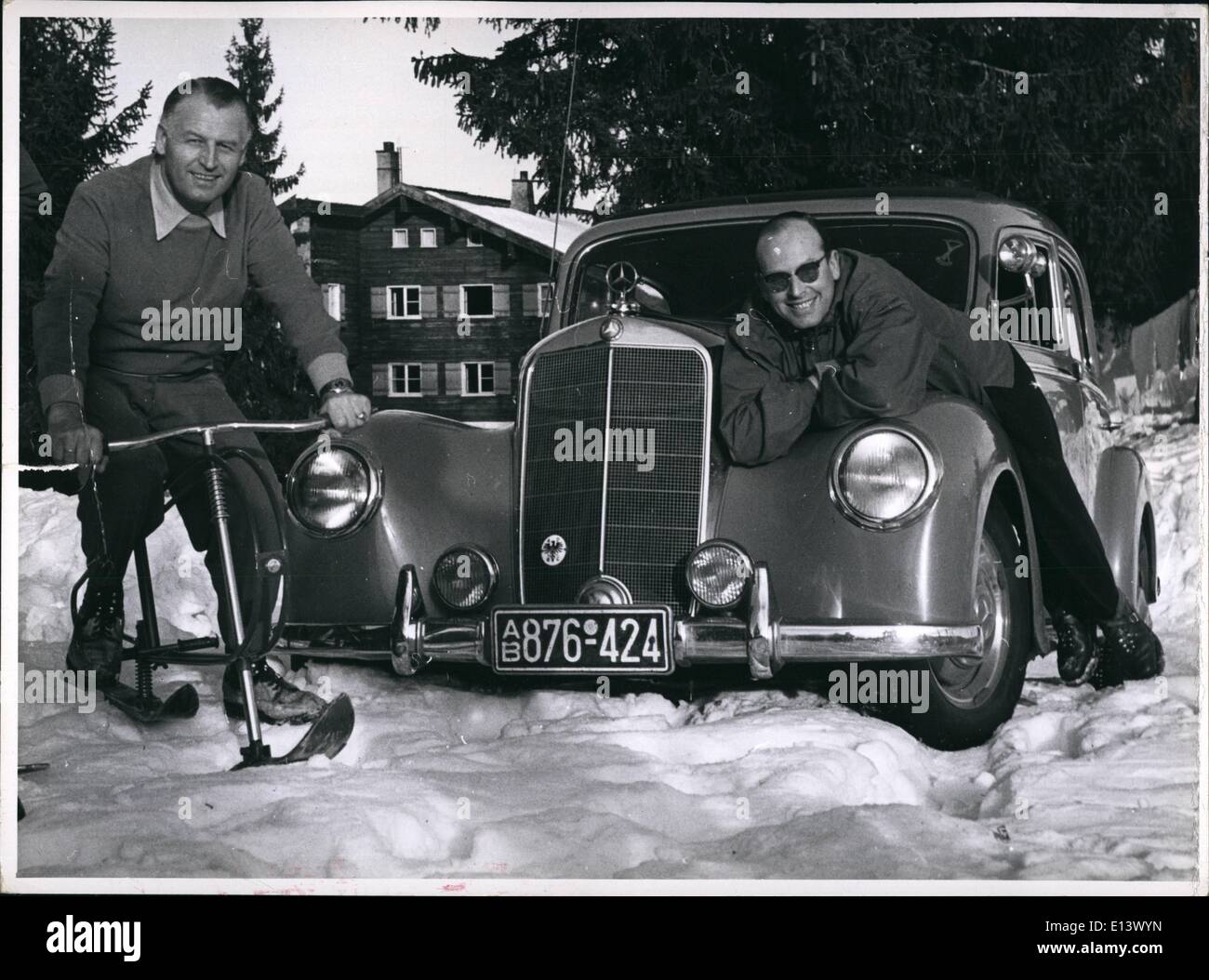 Mar. 27, 2012 - Karl Kling, Germany's sportsman Nr. 1. and Mercedes champion in Mexiko during his holidays in the Algau/South-West Germany. Karl Kling, this time on the steering wheel of a Skibob, and his companion in the most difficult motor - car race of the world in Mexiko, Klenk enjoy themselves after exerting racing - days in front of the Algau Berghof near Sonthofen/Algau. They like snow and sun in 1500 meters above sea - level. Stock Photo