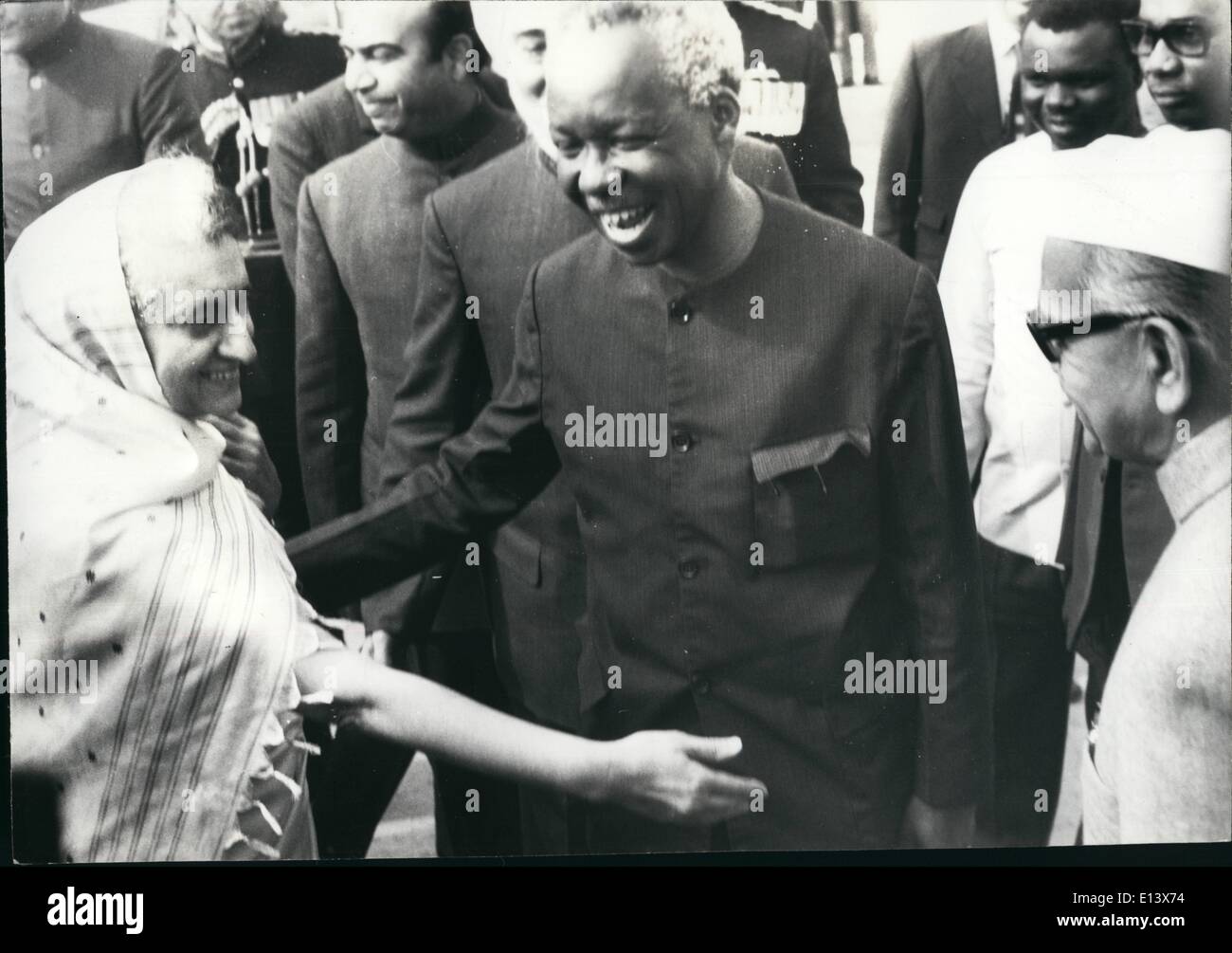 Mar. 27, 2012 - President Mwalimu Julius K. Nyerere of Tanzania enjoying a joke with President Fakharnddin Ali Ahmed and prime Minister Mrs. Indira Gandhi soon after his arrival at Palm airport in New Delhi on Friday - January 16, 1976, The Tanzanian president is here to receive Nehru Award for International Understanding at a function to the held tomorrow. Stock Photo