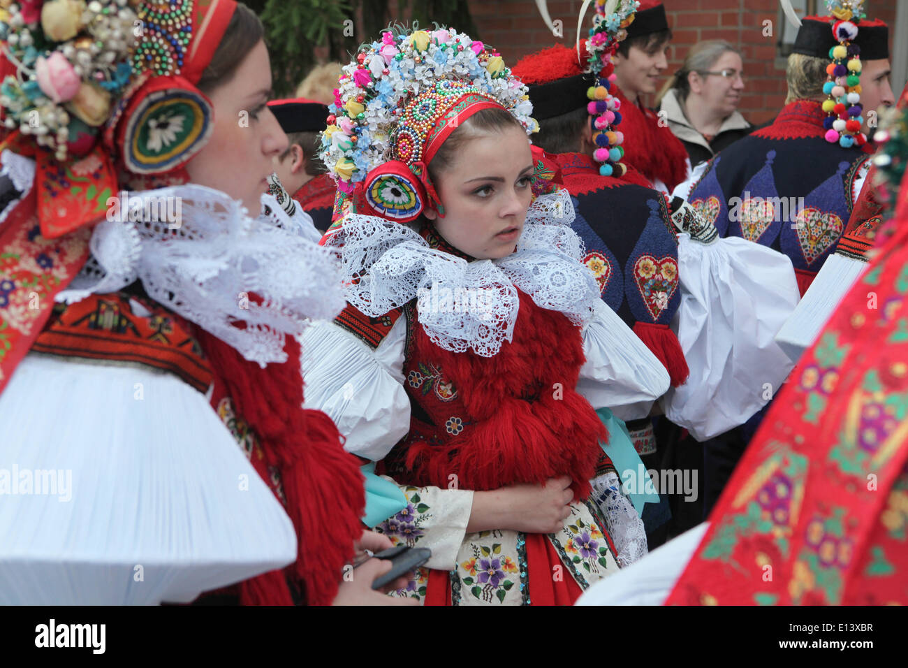 The Ride of the Kings. Traditional folklore festival in Vlcnov, Czech Republic. Young women dressed in traditional folk costumes Stock Photo