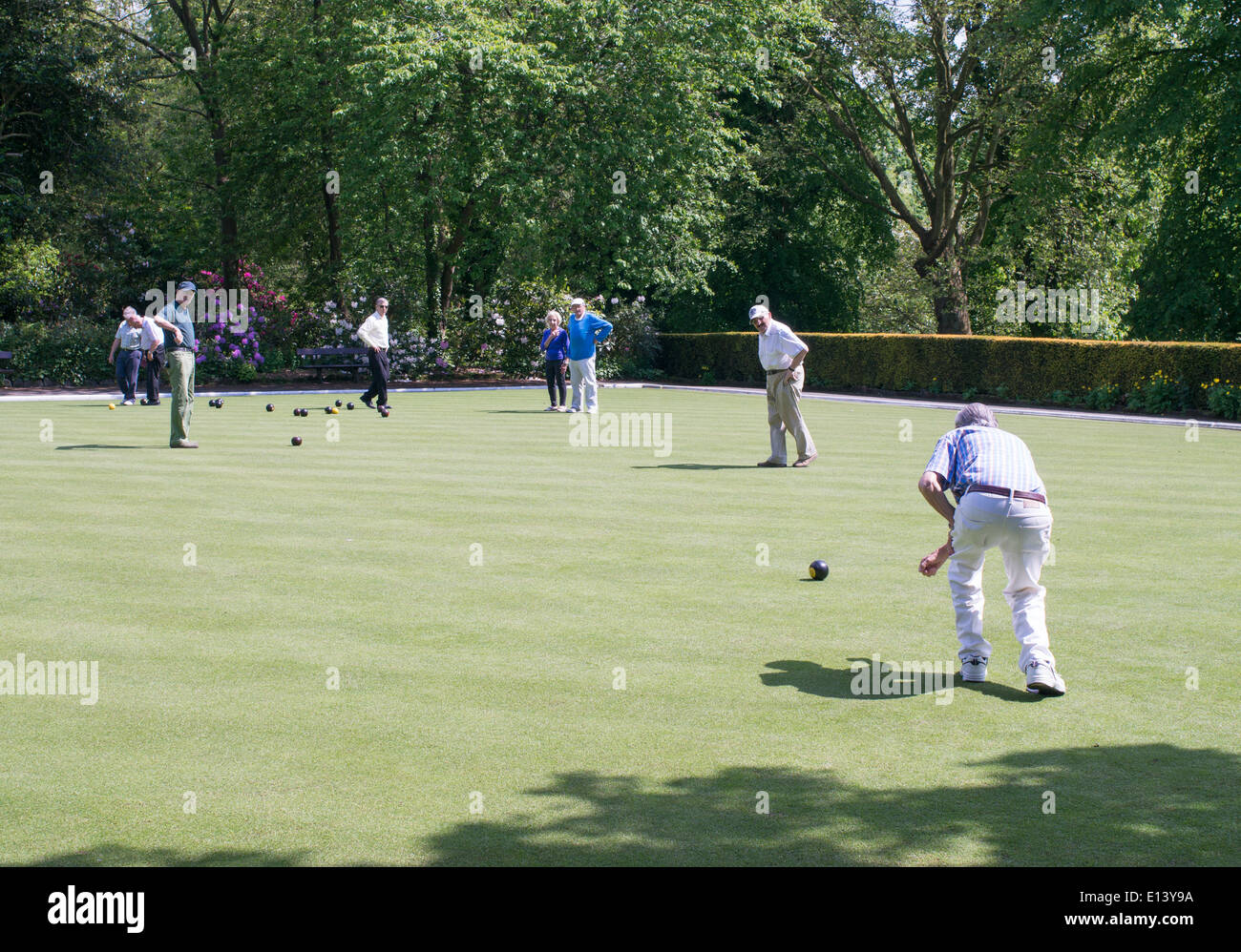 People playing crown green bowls in Roundhay Park, Leeds, West Yorkshire, England, UK Stock Photo