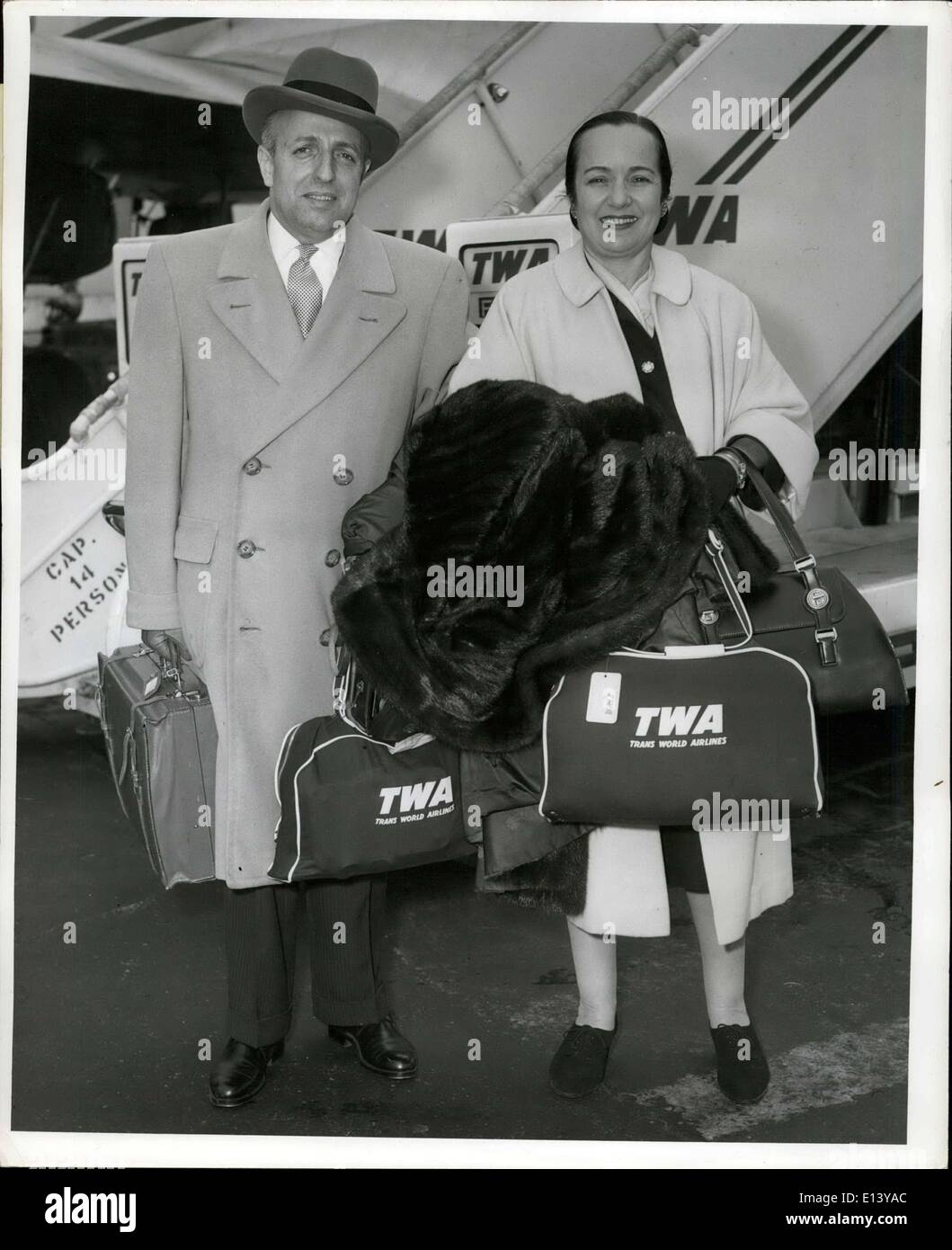 Mar. 31, 2012 - Idlewild Airport, N.Y., May 18 -- Marcel Palmaro, General Consul of Monaco To New York, And His Wife, were greeted by photographers after their arrival from London via TWA. Mr.Palmaro told newsmen that it is his hope to better inform Americans concerning the financial status of Monaco before the Rainier - Kelly Wedding. He said that the principality was sufficiently wealthy before the recent publicity but admitted that it wasn't doing Monaco any harm tourist-wise.om London via TWA. Mr Stock Photo