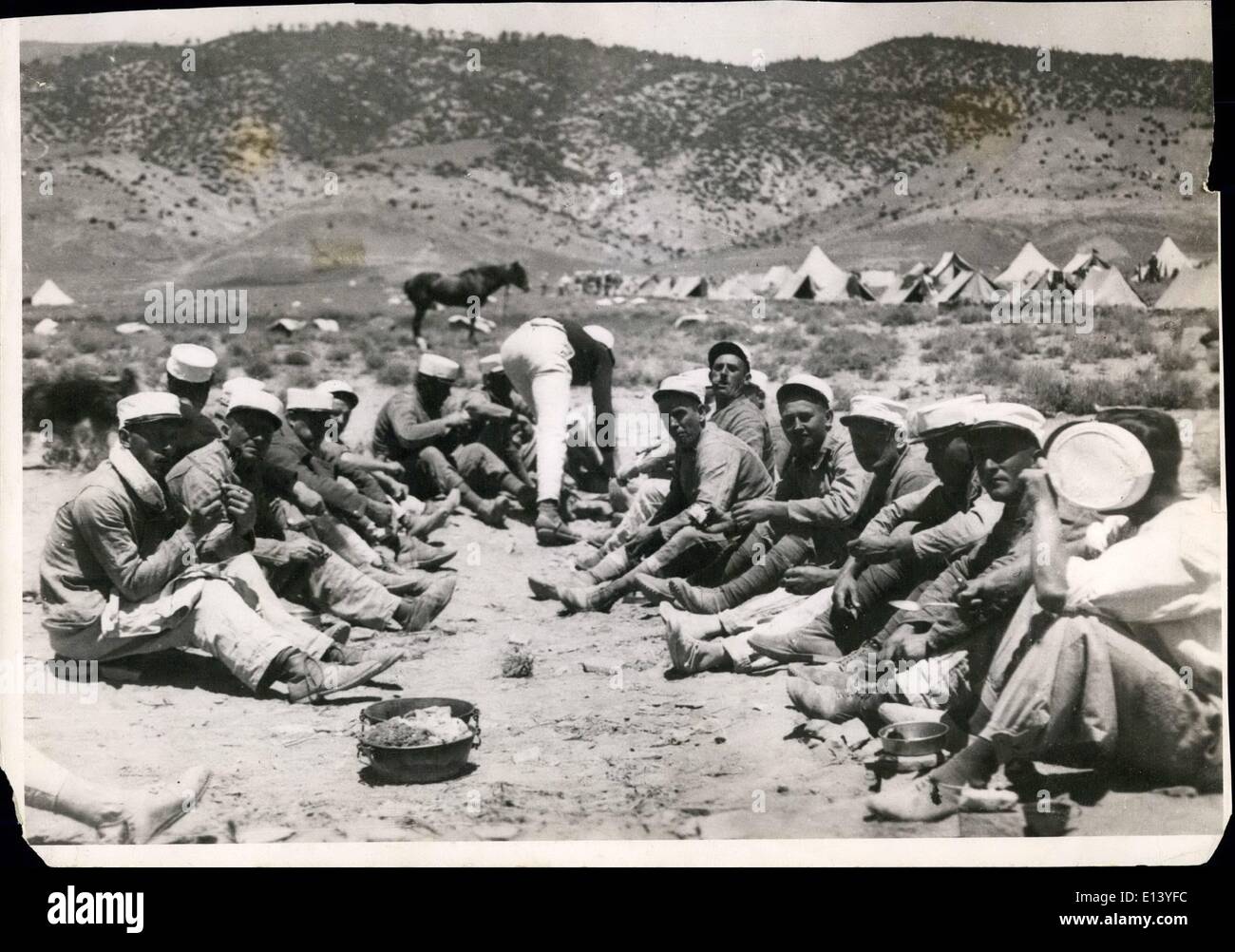 Mar. 27, 2012 - Soldiers of all nationalities, who have joined the French Foreign Legion are seen here having their frugal midday meal in the desert near Midelt, Morocco. Stock Photo