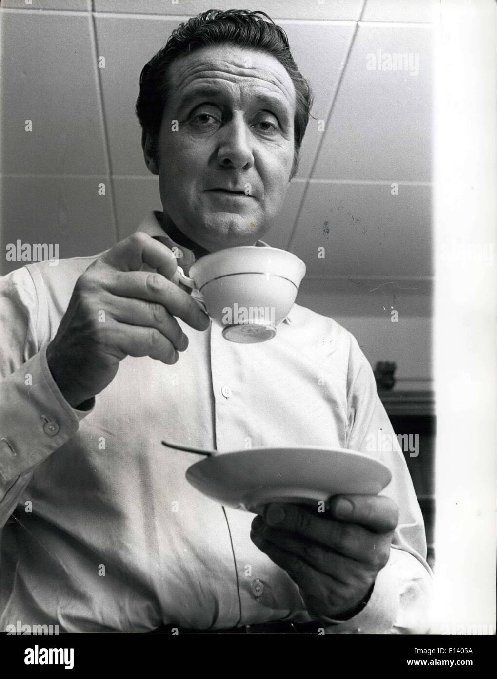 Mar. 31, 2012 - Patrick MacNee 'John Steed' in 'The Avengers' television series takes a short break between takes to enjoy a cup of tea. Stock Photo