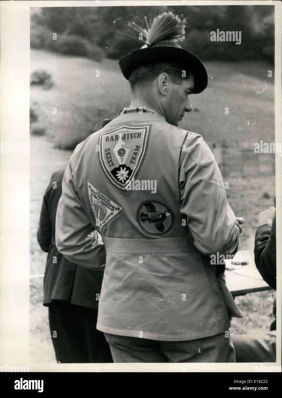 Mar. 31, 2012 - German-American Festival of Rifle-Men in Garmisch: The first German-American festival of rifle-men with firearms was held in Garmisch on September 12th and 13th, 1953. For this purpose the American army placed at the disc posal of the rifle-man 10,000 cartridges. All types of rifles were there, also these who had been hidden since the end of the war. They were shooting at a distance of 130 meters, freehand-shooting on targets, miniature-rifle shooting and pistols, but also clay-pigeon shooting. Representatives of well known Bavarian rifle-men clubs, American officers and G.I Stock Photo