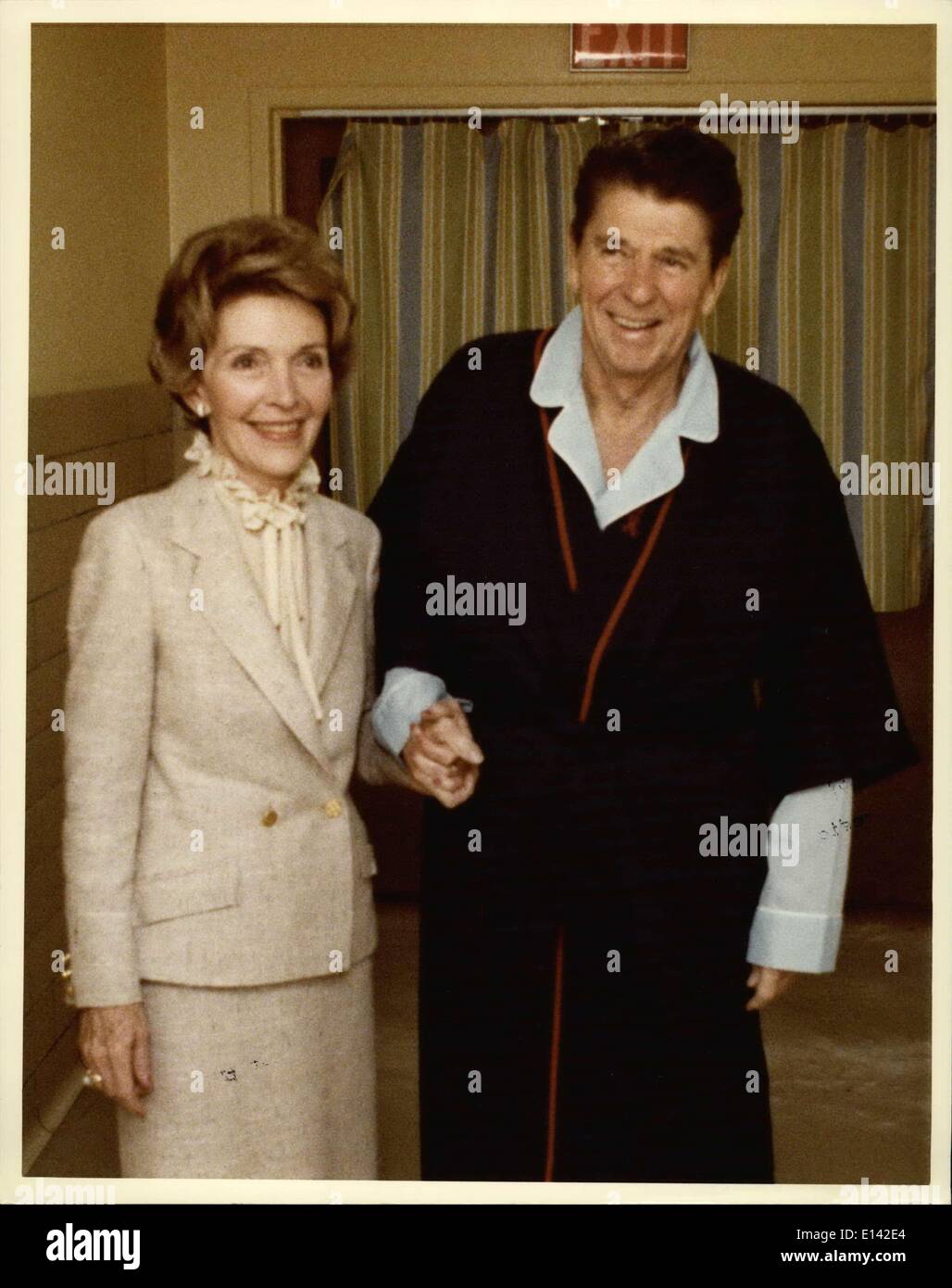 Mar. 31, 2012 - President and Mrs. Reagan taking a stroll down the corridor outside the hospital room at 12:30 p.m. Imag Stock Photo